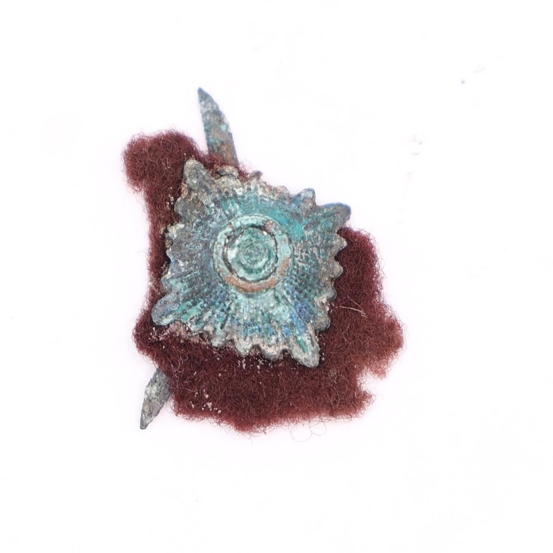 Miniature Breast Star, Hungarian Order of Merit: The item pictured is a miniature breast star badge for the Order of Merit of the Hungarian Republic, dating from around 1945. It is made of silvered bronze with red, white, and green enamel details.