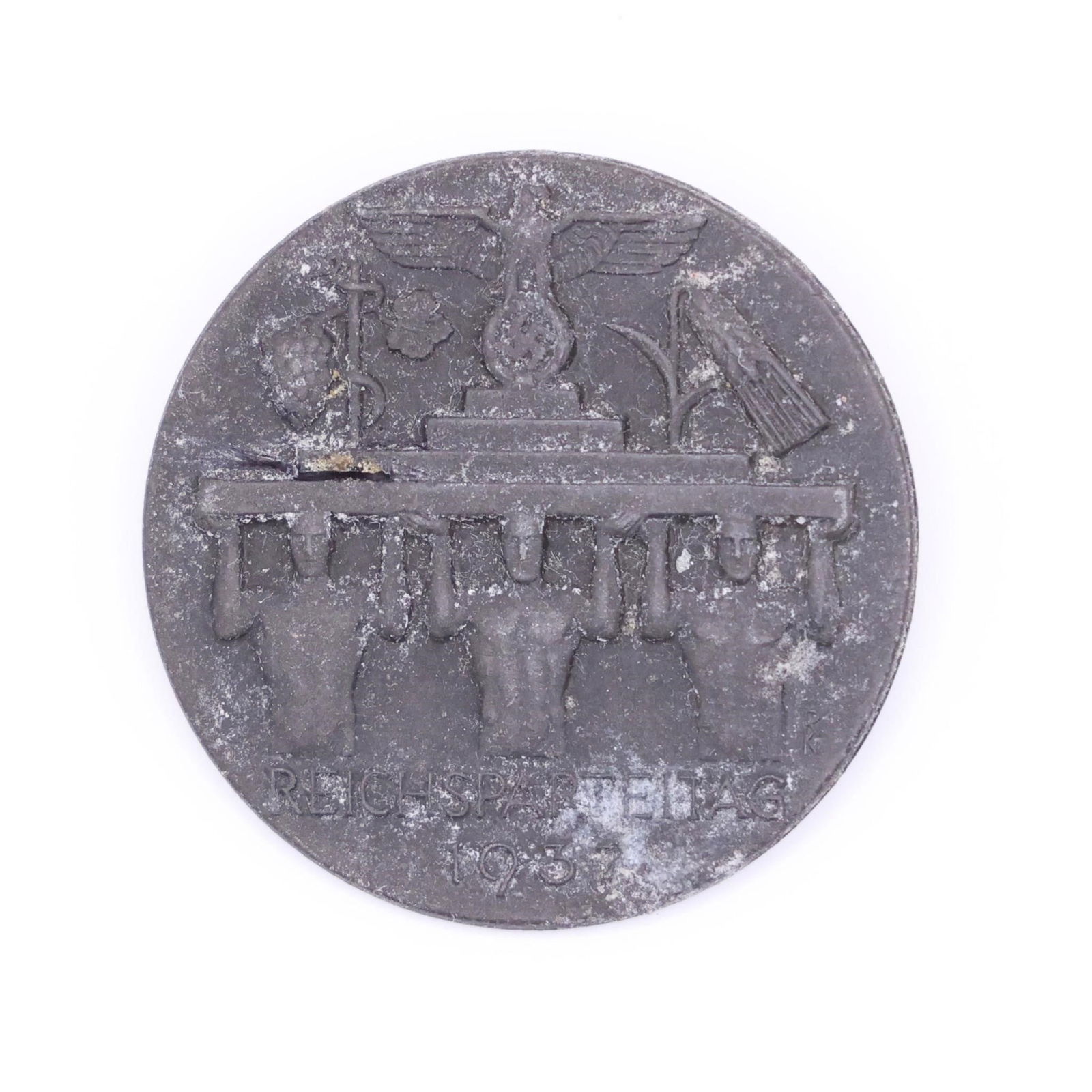 German WWII Reichsparteitag 1937 Tinnie: Original German WWII Reichsparteitag (Nazi Party Rally) 1937 tinnie, metal pinback, good condition, authentic period piece.