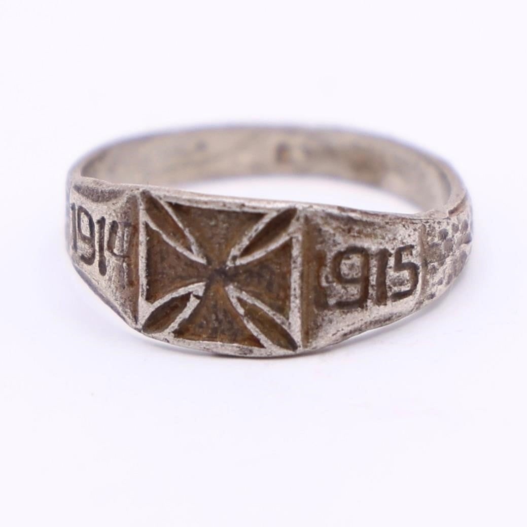 WWI German Silver Ring: WWI German Silver Ring featuring a raised Maltese-style cross on the front and simple engraved side details. Shows age wear and patina throughout, giving it a well-worn antique look.