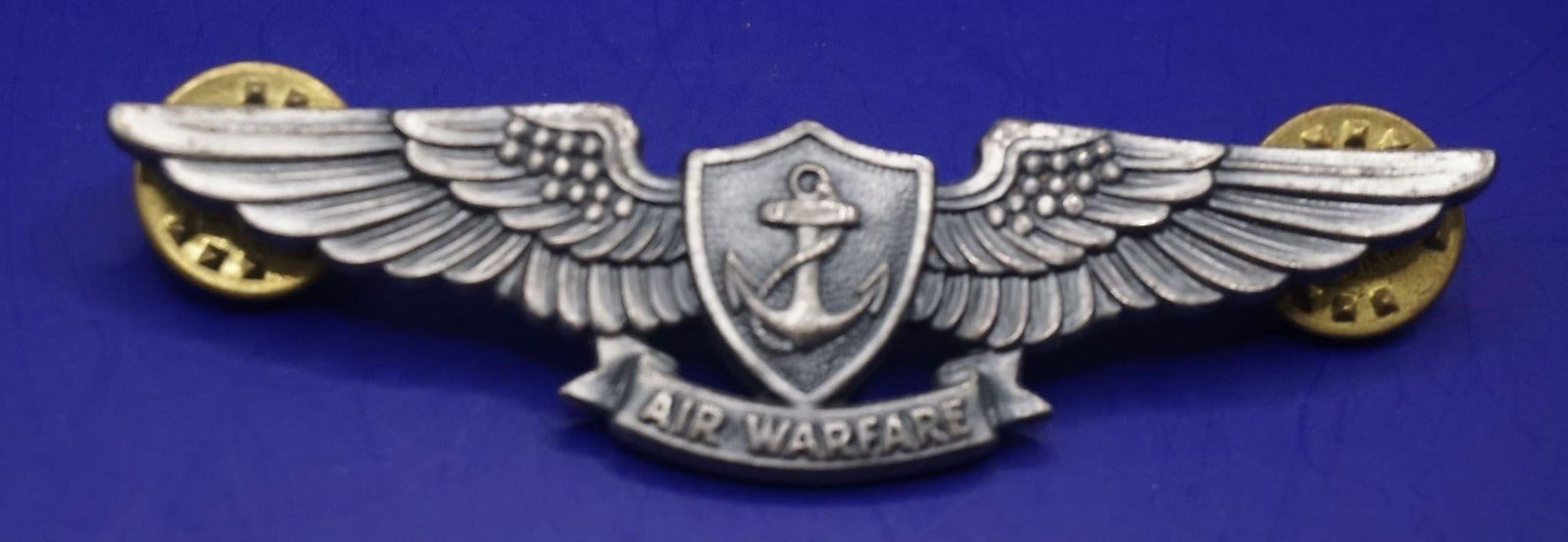 WWII US Navy EAWS Insignia: This is the U.S. Navy Enlisted Aviation Warfare Specialist (EAWS) insignia. The military badge was established in March 1980 to recognize enlisted personnel with specific skills and knowledge in naval