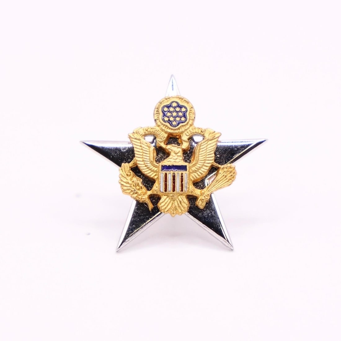 U.S. Army General Staff Officer Collar Insigniapin: This item is a United States Army General Staff Officer collar insignia pin.