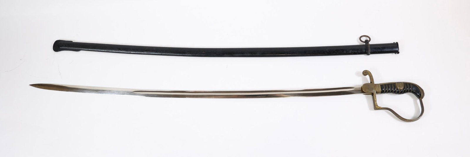 German Army Officer Dress Sword: German Army officer's dress sword from the WWII era, likely produced by a Solingen maker such as Puma or Carl Eickhorn. A collectible military piece from the period.