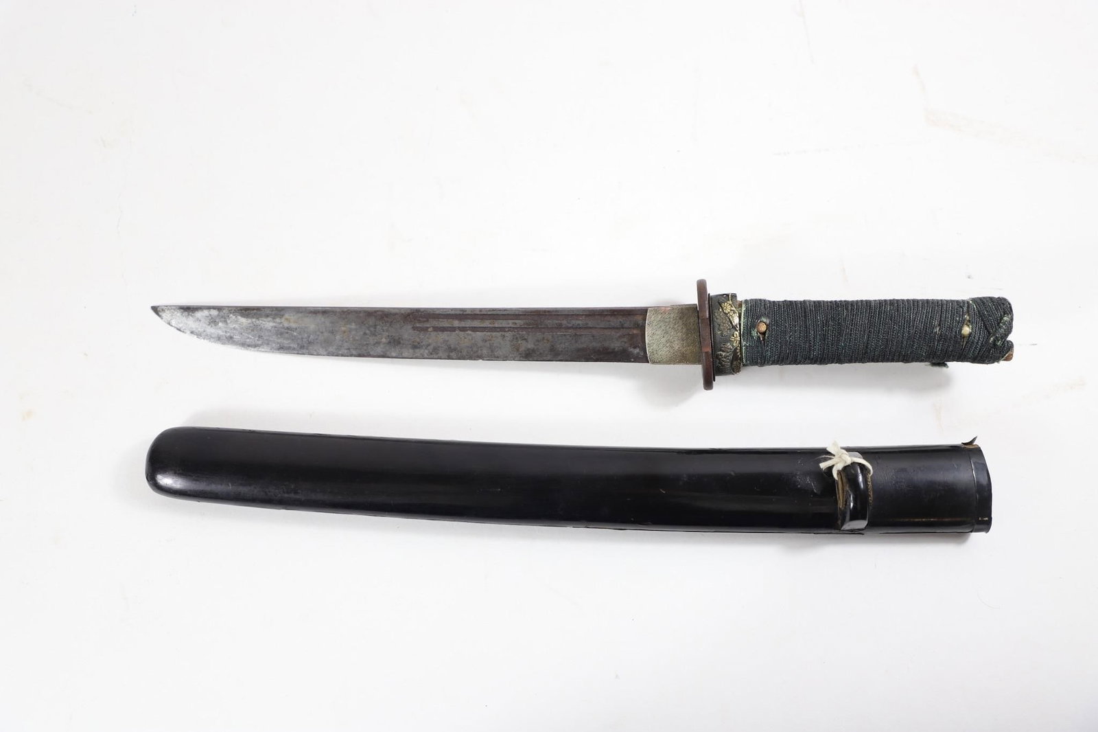 Japanese Tant Sword with J-t-h Certificate: This image displays a Japanese short sword (Tant) together with its official firearms and sword registration certificate (J-t-h, ). The certificate authorizes legal ownership in Japan and records