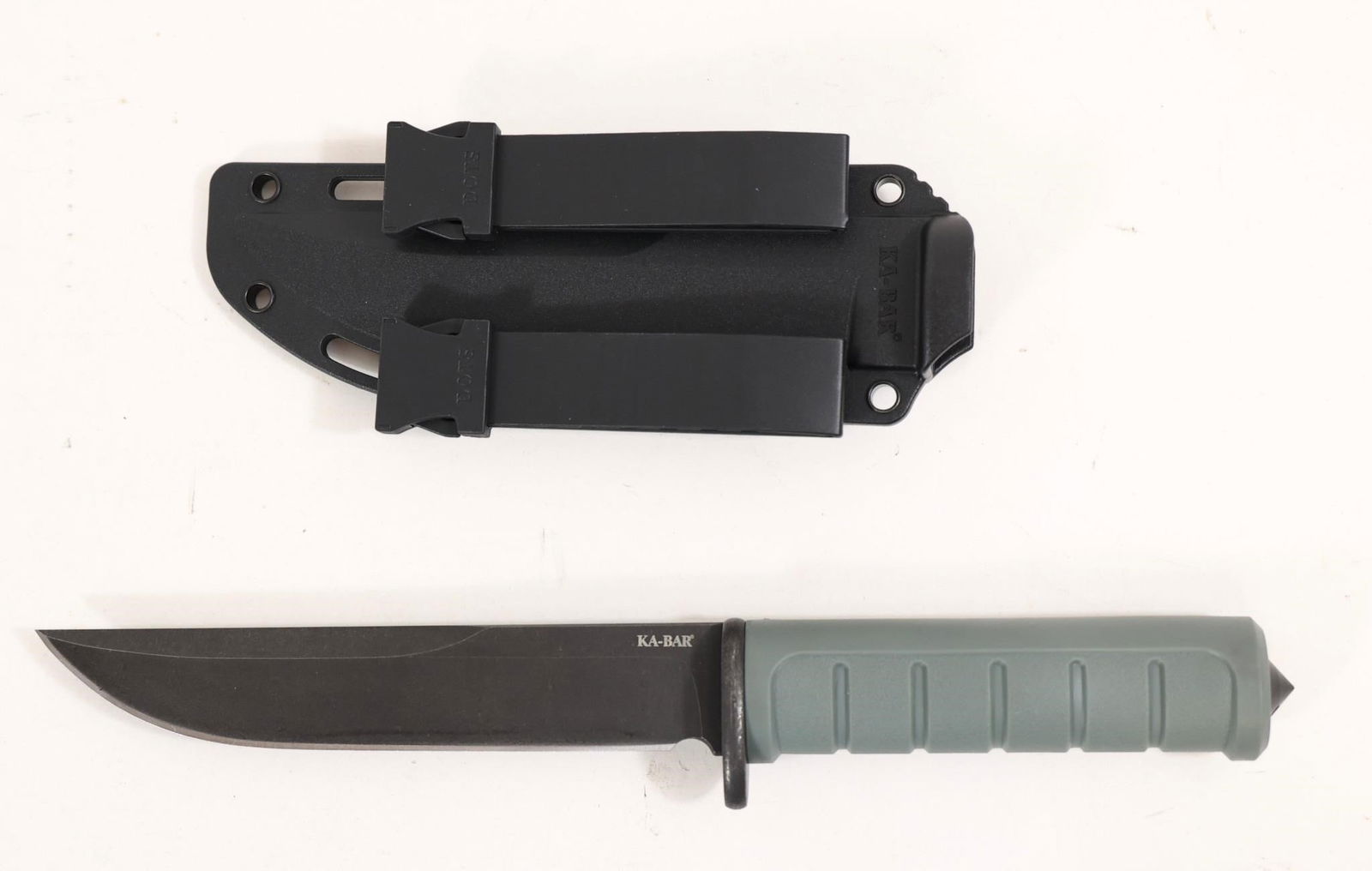 Ka-bar Dust Ii Green Blk 9.88" Fixed Blade Knife: This Ka-bar Dust Ii Green Blk 9.88" Fixed Blade Knife Features A 5.25-inch D2 Steel Clip Point Blade Set On An Ergonomic Glass Filled Nylon Handle For Reliable Grip And Control. The Blade Uses A Flat
