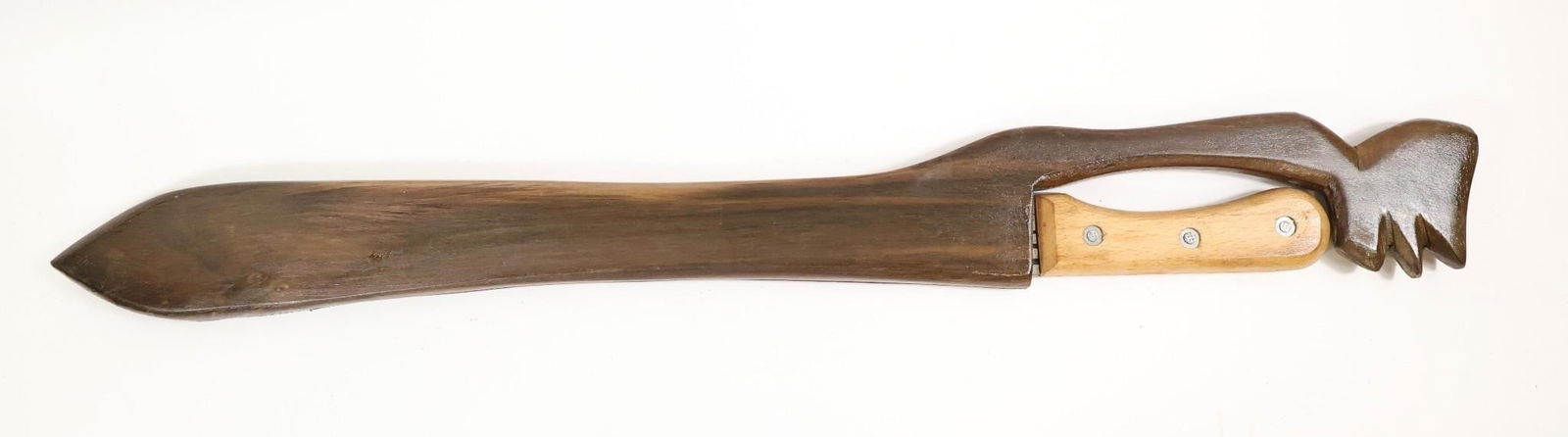 WWII British Martindale Birmingham Machete: WWII British Martindale Birmingham machete with the crocodile logo, marked "Made in England." Features a simple wooden grip and comes in a carved wooden sheath with a decorative animal-head design.