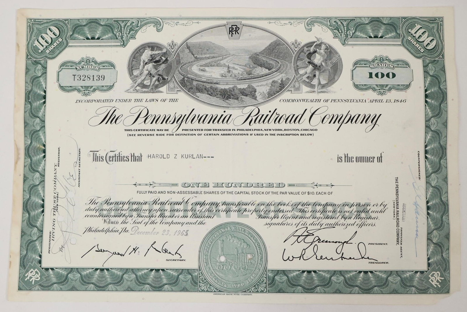 Pennsylvania Railroad Stock Certificate 1965: Vintage Pennsylvania Railroad Company stock certificate for one hundred shares. The item is a popular collectible in scripophily (the study and collection of stock and bond certificates). December 23,