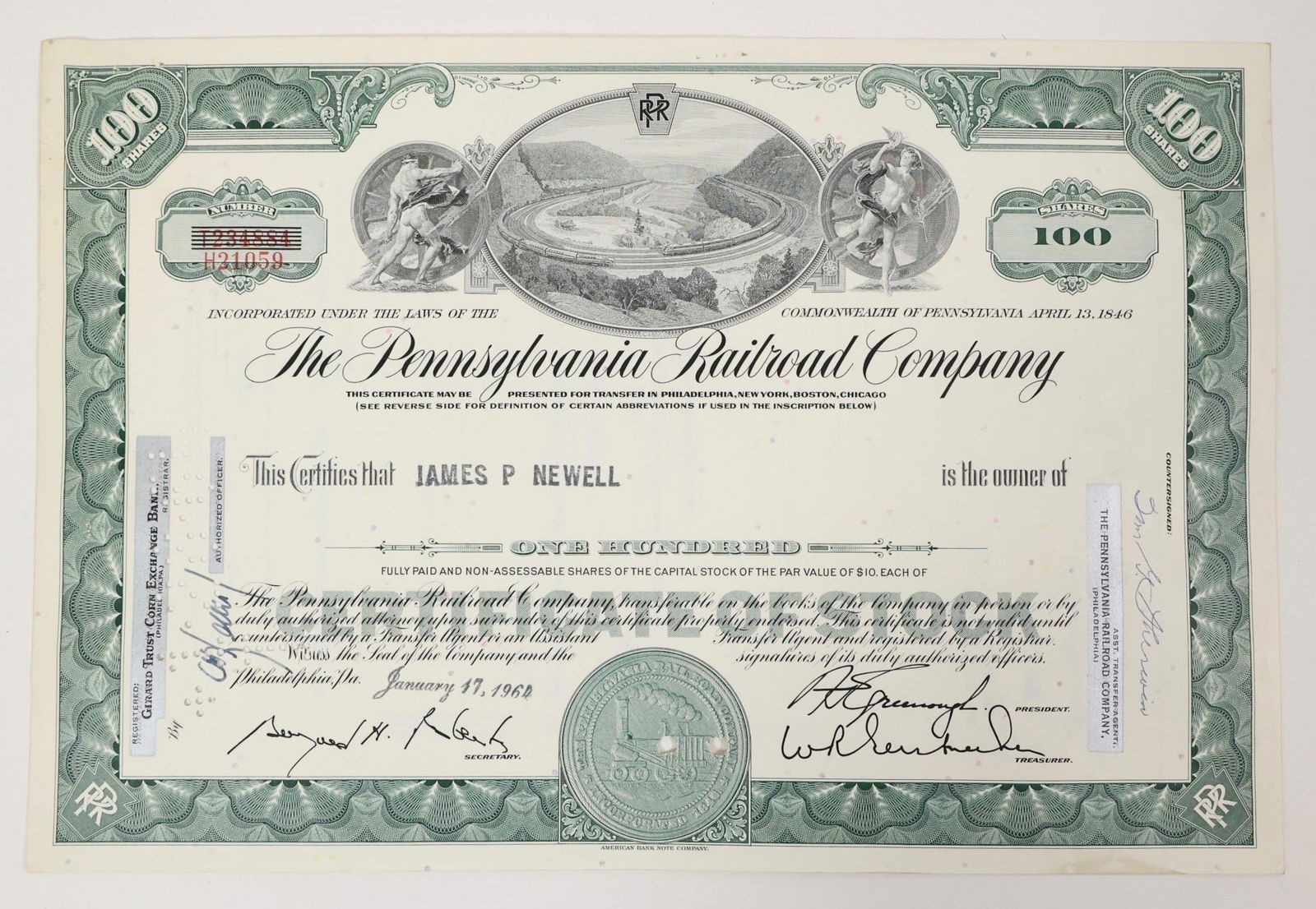 Pennsylvania Railroad Stock Certificate 1964: Pennsylvania Railroad Company stock certificate, issued for 100 shares to James P Newell on January 17, 1964. The certificate is valued as a collectible item today.