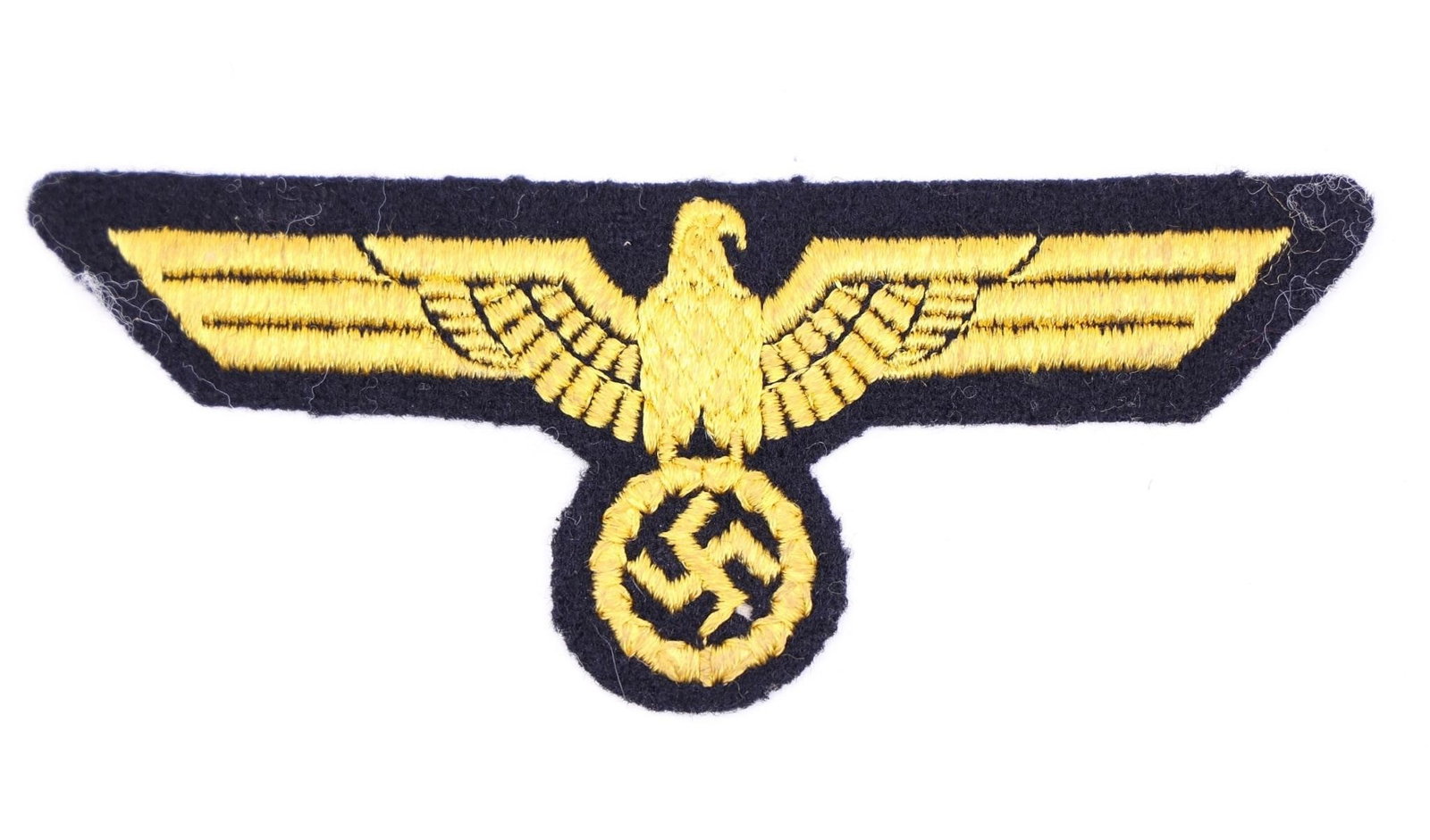 Kriegsmarine Yellow Breast Eagle Patch: Original German Third Reich Kriegsmarine embroidered breast eagle (Hoheitsadler) with eagle-and-swastika design, yellow thread on cloth backing. Period uniform insignia, good condition.