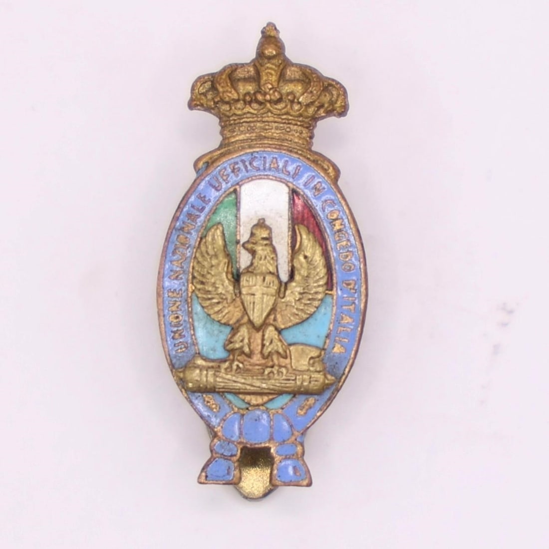 Italian UNOCI Badge 1927 Donzelli Milano: Spilla "Unione Nazionale Ufficiali in Congedo d'Italia" dated 1927, manufactured by Donzelli Milano. Measures approximately 27 x 12 mm. A fine period piece associated with Italian military officers'