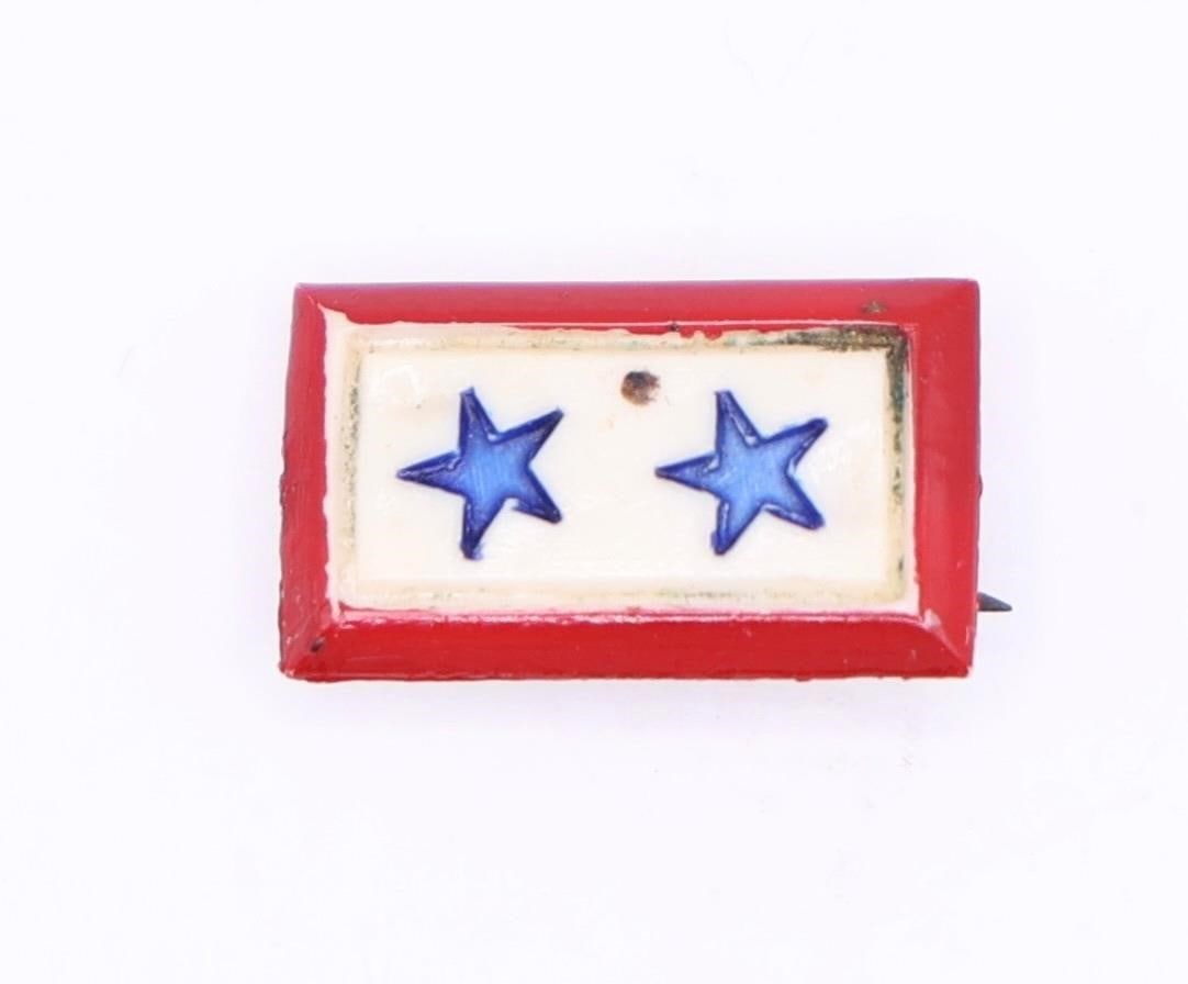 World War II Era "Son In Service" Lapel Pin: Vintage World War II era "son in service" lapel pin. These pins were worn by civilians to indicate that a family member was serving in the U.S. Armed Forces. The pin features a white field with two