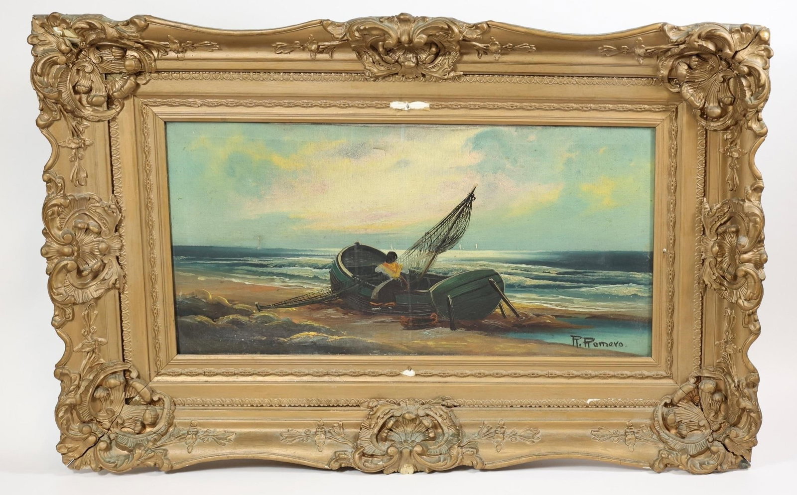 R. Romero Seascape Oil Painting: Oil on canvas seascape depicting fishing boats on the shore, signed lower right "R. Romero." Canvas has two punctures. Painting measures approximately 34 × 22 inches and is presented in an ornate gil