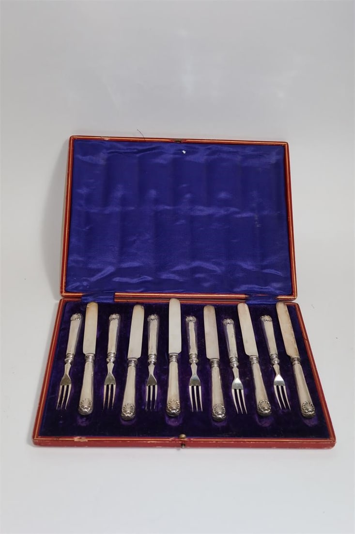 Vintage Victorian Silver Dessert Service: Vintage Victorian fitted three-tier mahogany cased set of silver dessert cutlery for twelve, consisting of six knives and six forks.Approximate case dimensions: 33 cm x 25 cm x 7 cmApproximate knife