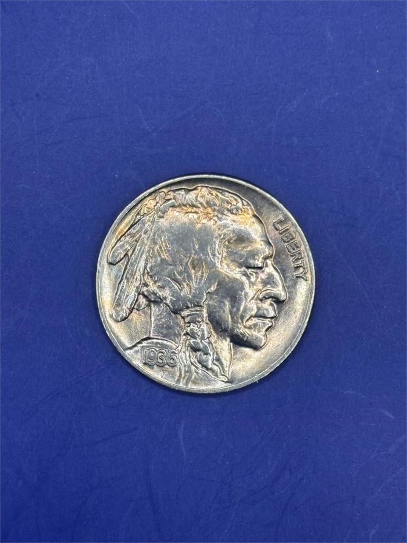 1936 Buffalo Nickel: Size: 0.8 inFive-cent copper-nickel coin was minted by the United States from 1913 to 1938 and was designed by sculptor James Earle Frase.