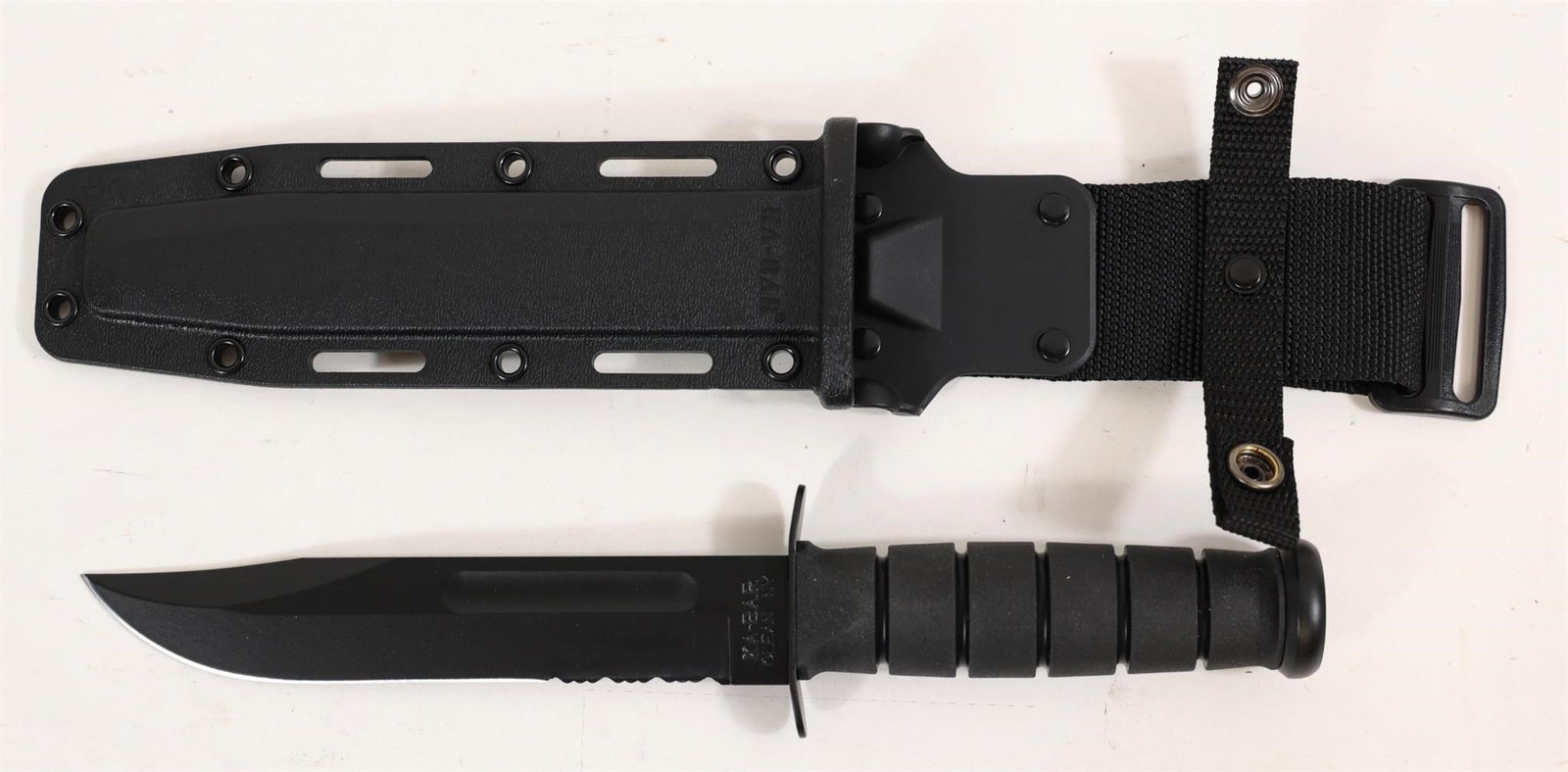 Ka-bar 1214 Black Full-size 11.75" Knife: This Ka-bar 1214 Black Full-size 11.75" Knife Combines A Robust 1095 Cro-van High-carbon Steel Blade With A Partially Serrated Edge For Efficient Slicing Of Synthetic Materials And Handling Tougher