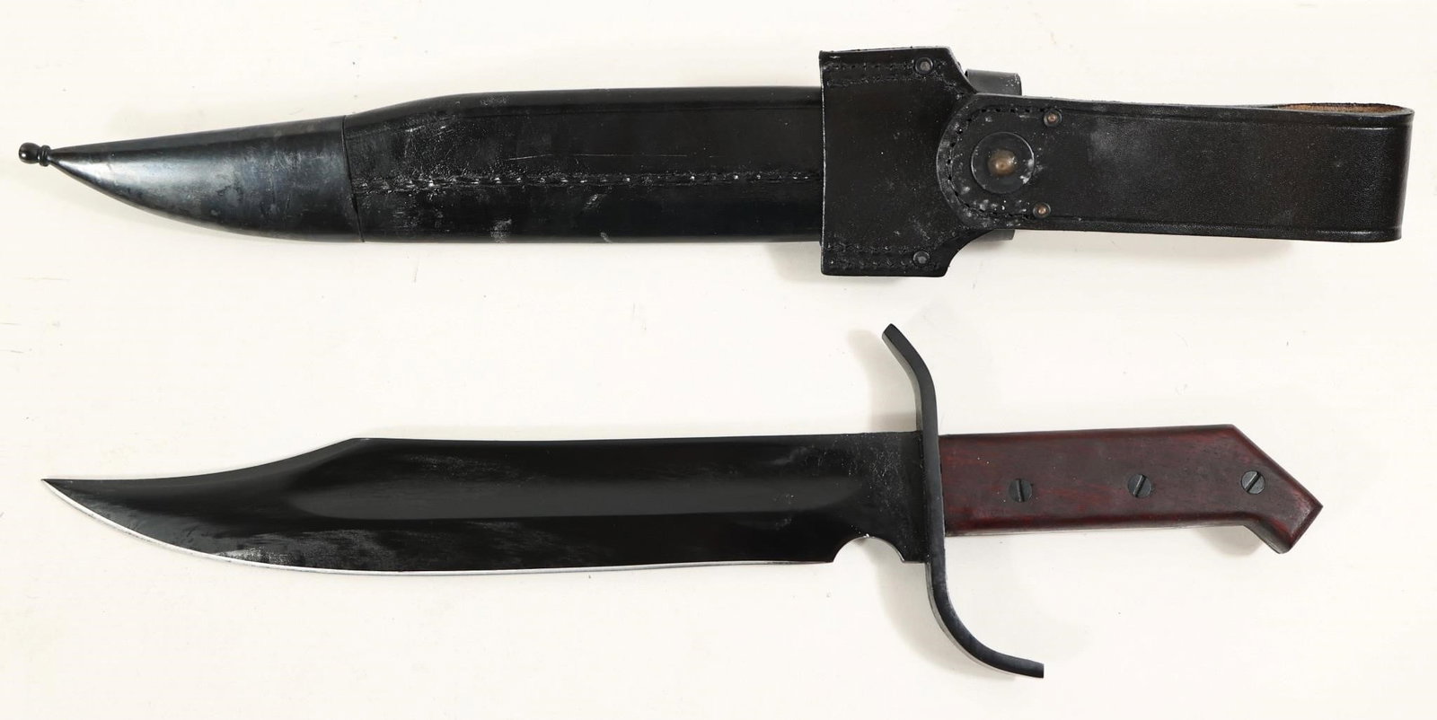 Cold Steel 1917 Frontier Bowie 17.62in Knife: This bowie is a robust combat style blade built from 1055 carbon steel offering a 12 1/4-inch blade and a 17 5/8-inch overall length that balances reach and control. The blade measures 1/4-inch thick