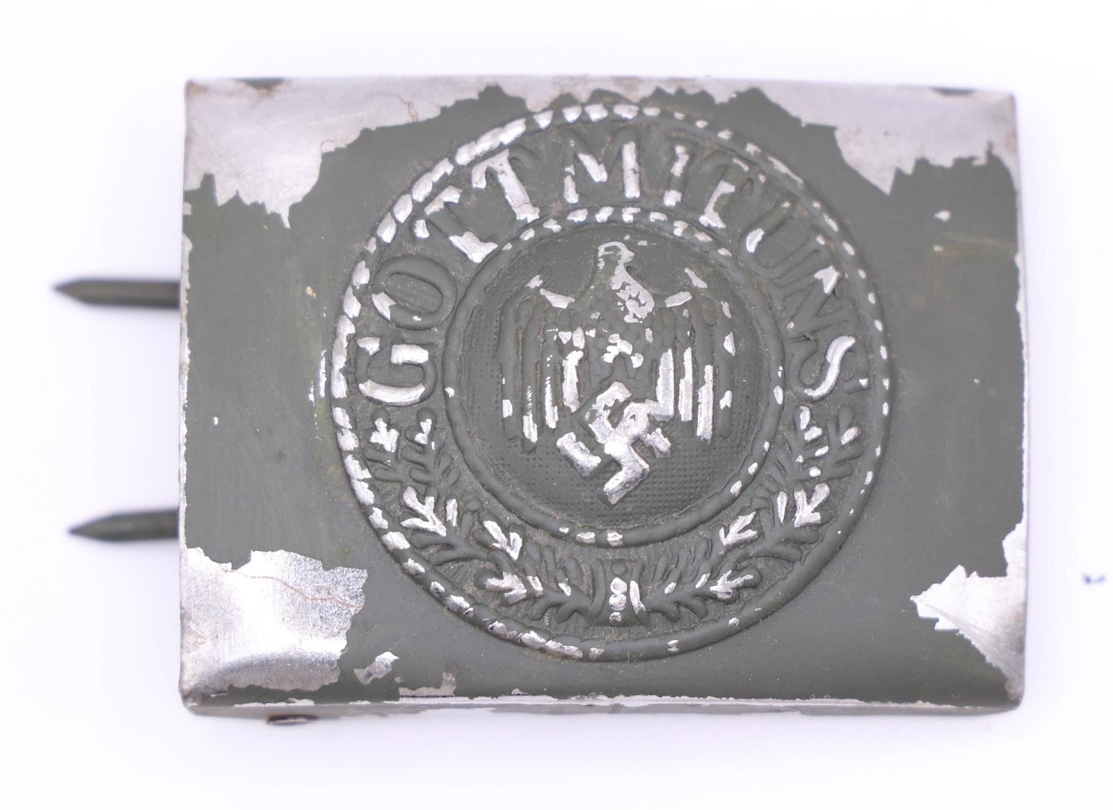 Late War Heer/Kriegsmarine Buckle: This late-war Heer/Kriegsmarine steel belt buckle features dark blue paint and intact reverse prongs, maker marked JFS. Produced for use by both the Heer and Kriegsmarine, it represents the functional