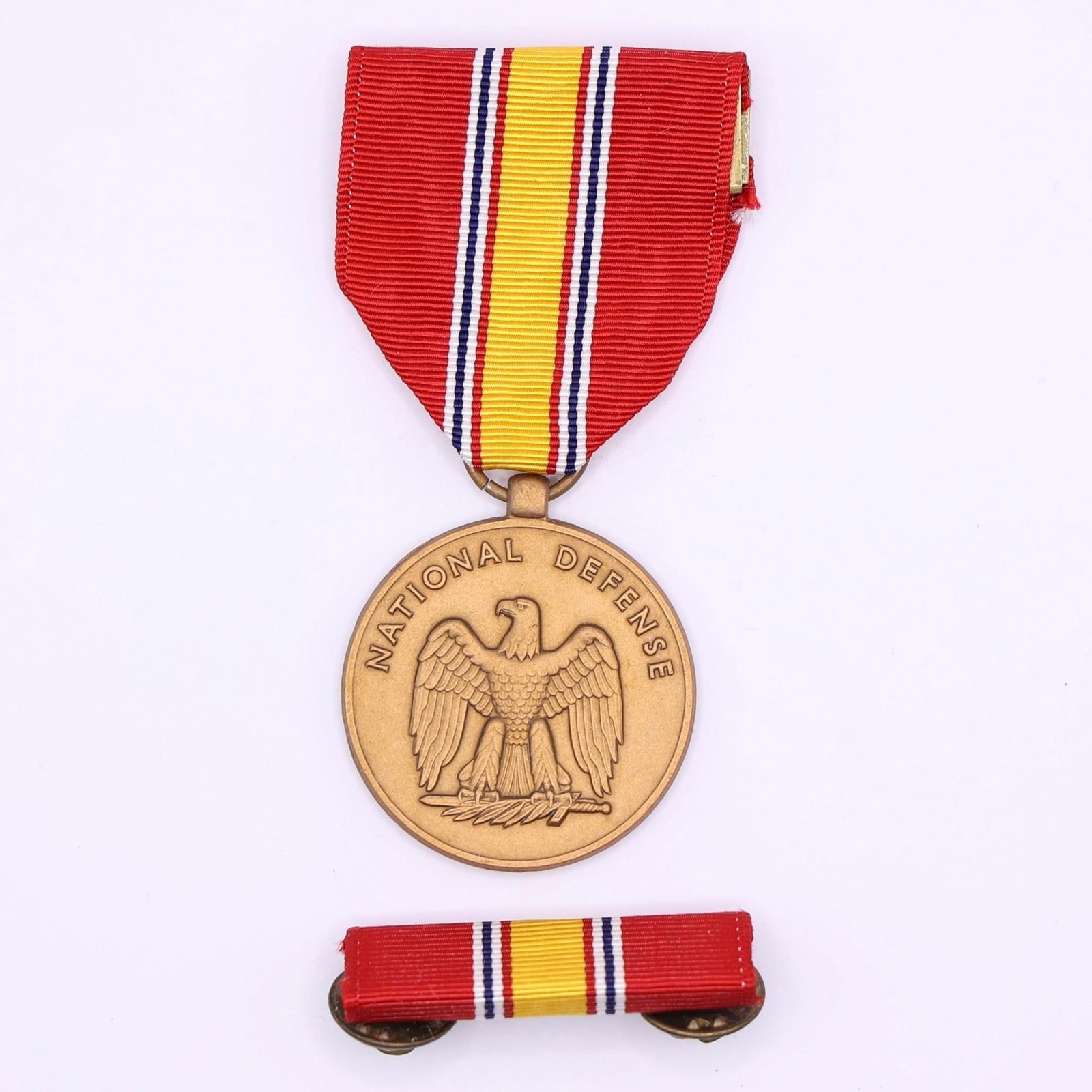 US National Defense Service Medal: National Defense Service Medal (NDSM). This U.S. military decoration is presented to service members who served on active duty during a declared "national emergency"Dimensions: 4.5in x 2 1/4in