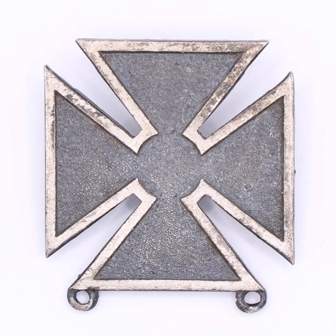 WWII US Army Marksman Qualification Badge: This is a US Army Marksman Qualification Badge. The badge is a white metal (silver, nickel, or rhodium) cross pattée, 1 inch in height. It is awarded to personnel upon successful completion of a weap