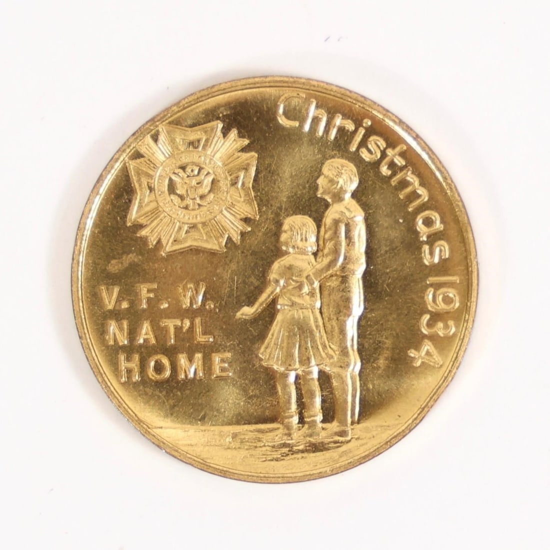 1934 V.F.W. National Home Christmas Token: This item is a vintage 1934 Christmas token from the Veterans of Foreign Wars National Home.