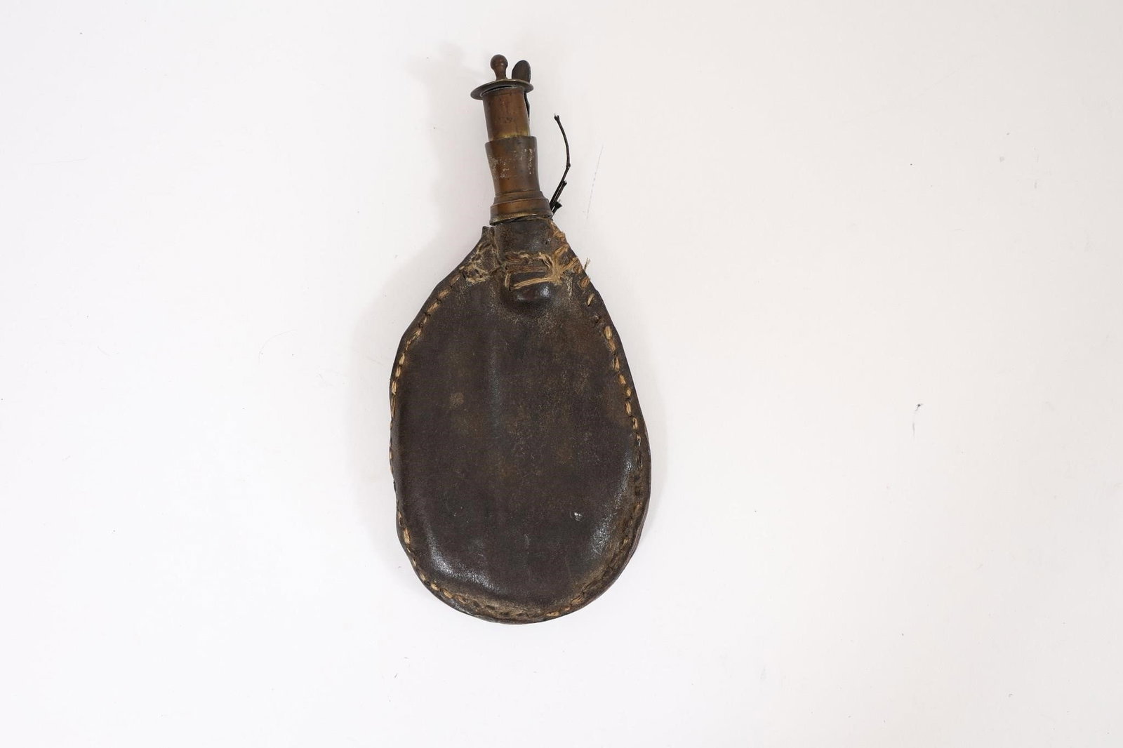 19th C. Leather Shot/Powder Flask: Antique 19th-century leather shot or powder flask, historically used for carrying gunpowder or lead shot for muzzle-loading firearms. Classic period form with wear and patina consistent with age.