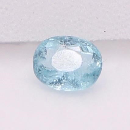 Paraiba Tourmaline 1.11 Ct - Mozambique (AIG): Natural Paraiba tourmaline loose gemstone weighing 1.11 carats, featuring an oval faceted cut and attractive green-blue color. The stone measures 7.16 x 5.81 x 3.65 mm and originates from