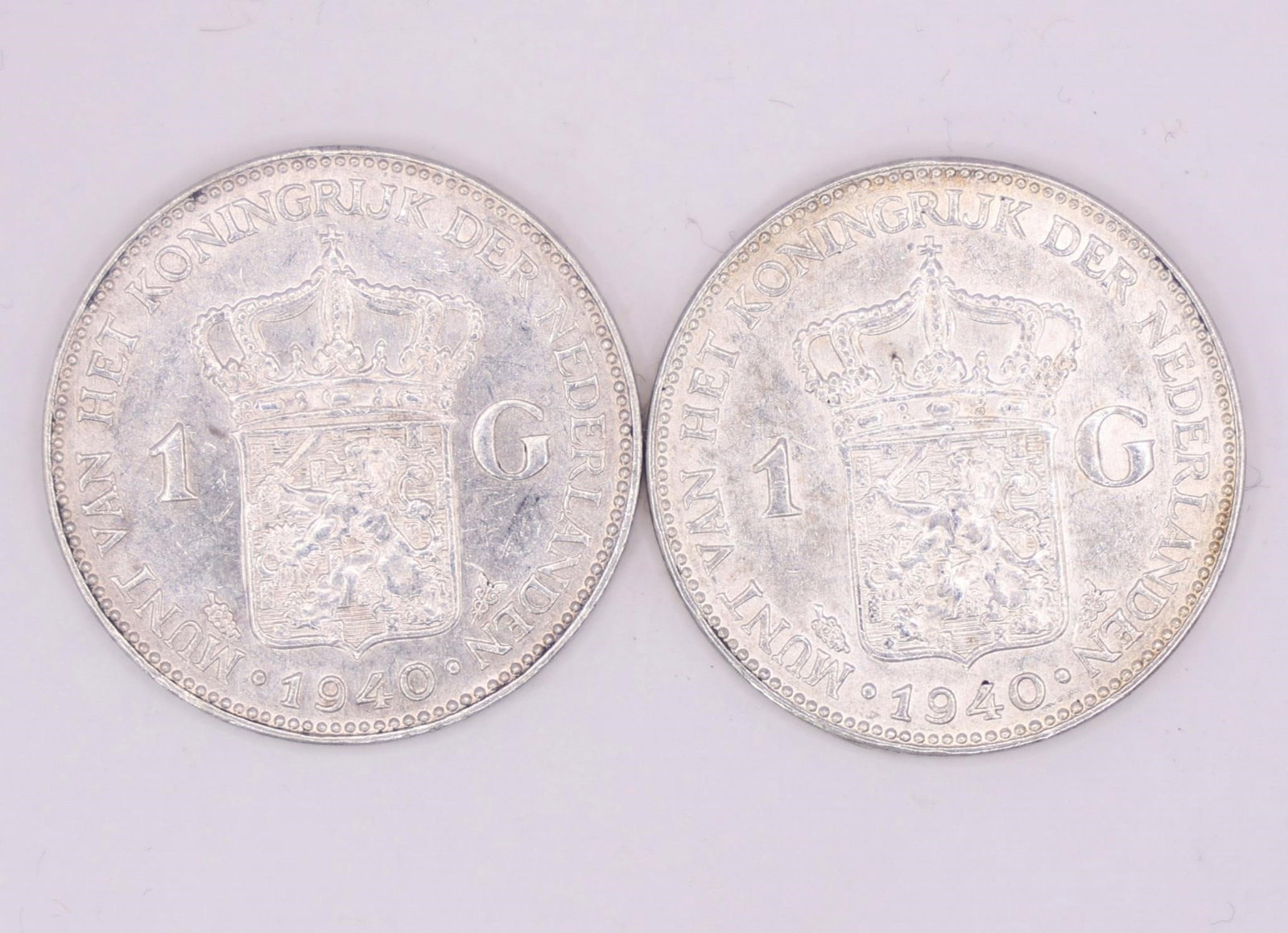 1940 Netherlands Queen Wilhelmina Silver Gulden: Two 1940 Netherlands silver 1 Gulden coin featuring Queen Wilhelmina, struck in .720 silver.