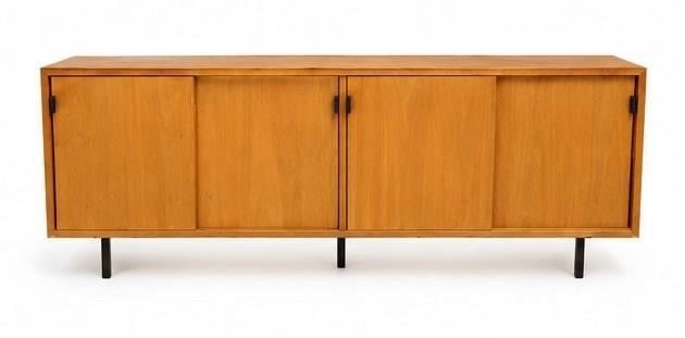 1950s Florence Knoll Associates Oak Credenza: Vintage 1950s Florence Knoll Associates oak four-door credenza featuring a clean-lined mid-century modern design with sliding doors and black legs. Spacious interior for storage with a minimalist prof