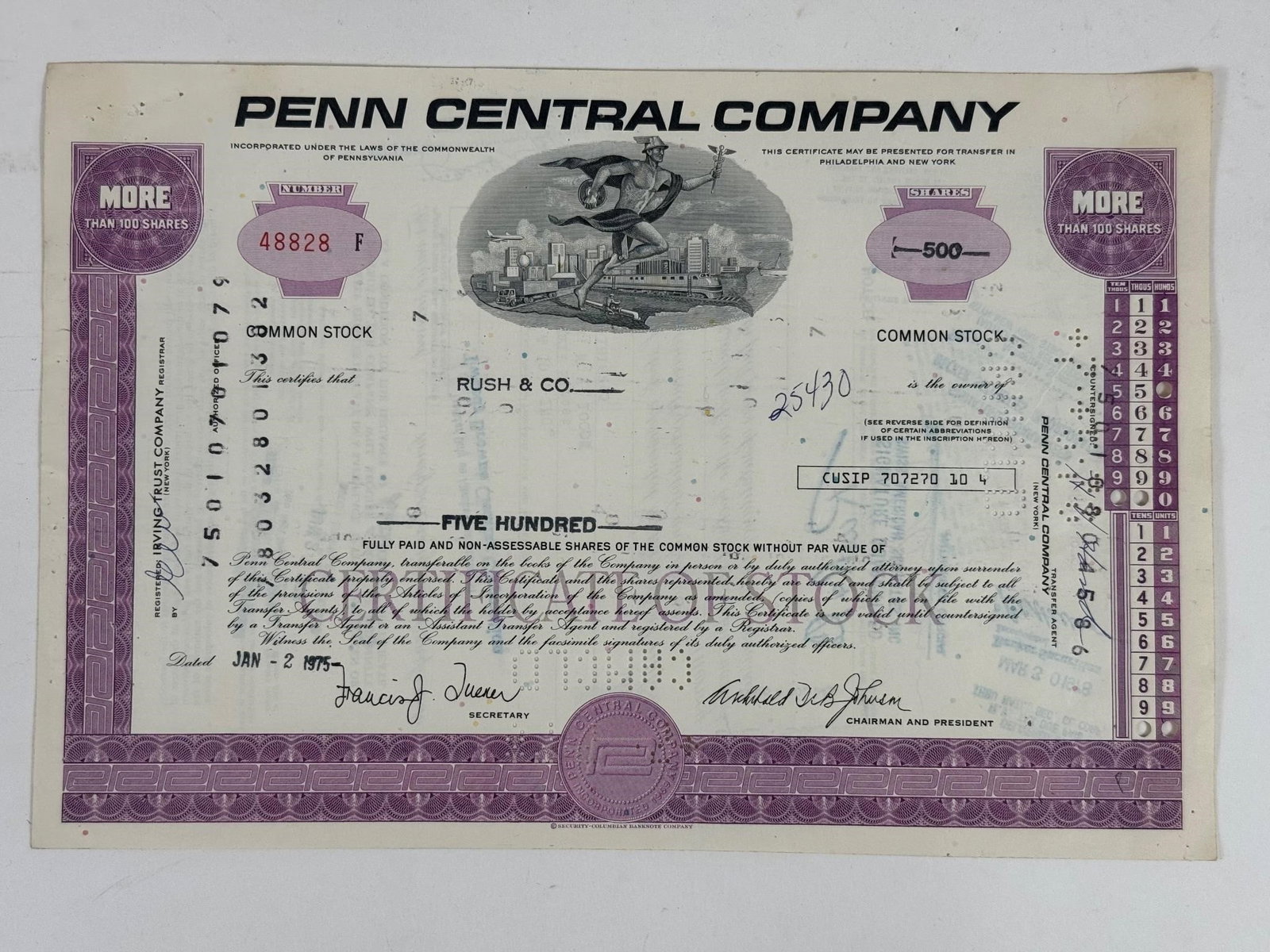 Penn Central Company Common Stock Certificate: Vintage Penn Central Company common stock certificate representing 500 fully paid and non-assessable shares of common stock without par value. Dated January 2, 1975, in a purple color variant. Penn Ce