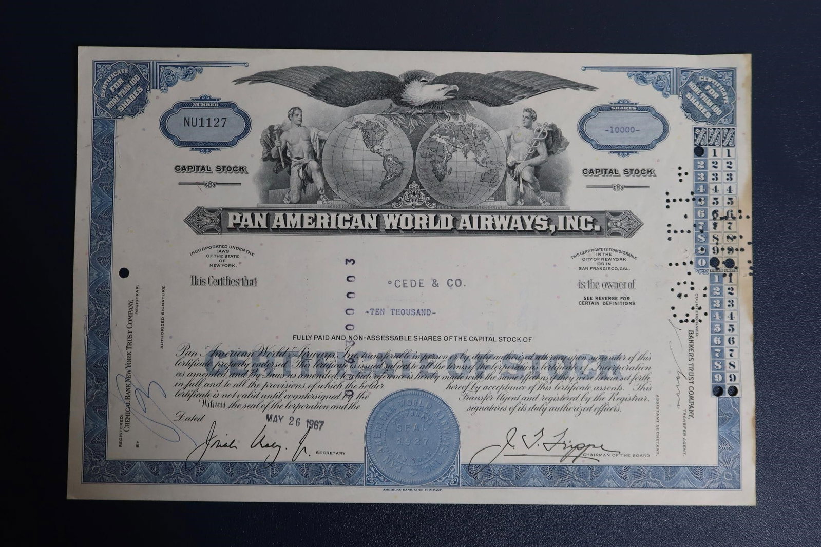 Pan American World Airways Stock Certificate: A collectible Pan American World Airways, Inc. stock certificate. It is valued as a historical financial document and a piece of cultural significance rather than for any ownership rights in the defun