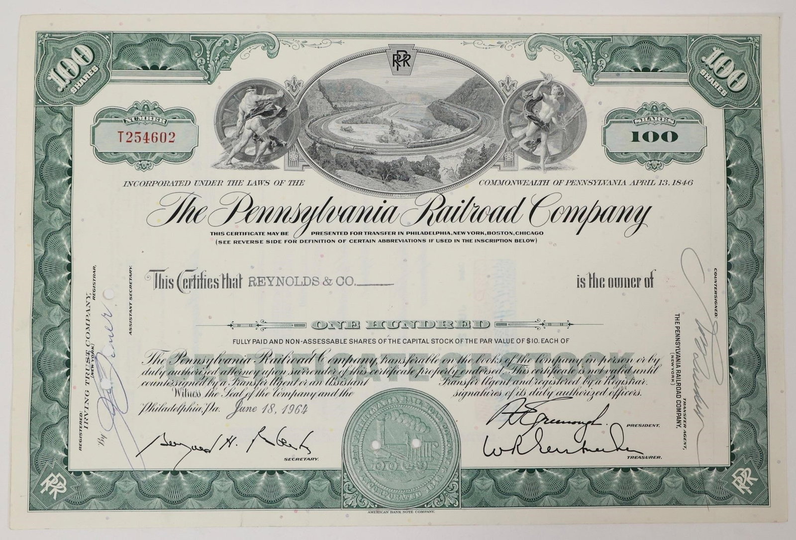 Pennsylvania Railroad Stock Certificate 1964: 1964 Pennsylvania Railroad Company stock certificate for 100 shares, issued to Reynolds & Co. These documents are now sold as historical collectibles and do not represent any ownership rights in the c