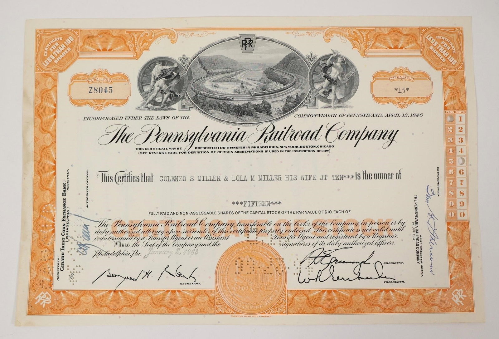 Pennsylvania Railroad Stock Certificate 1964: Original, cancelled stock certificate for The Pennsylvania Railroad Company. The certificate is for fifteen shares with a par value of $10 each. It was issued to Colenzo S Miller and Lola M Miller on 