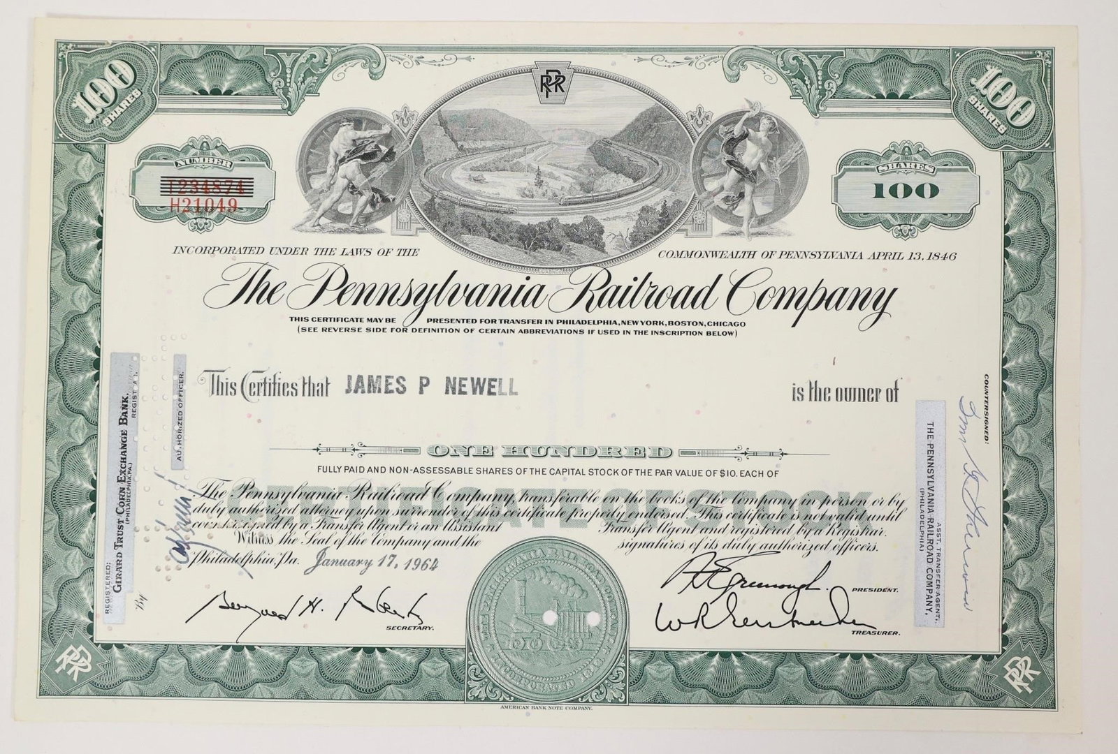 Pennsylvania Railroad Stock Certificate 1964: Collectible 100-share stock certificate from The Pennsylvania Railroad Company, issued to James P. Newell on January 17, 1964.