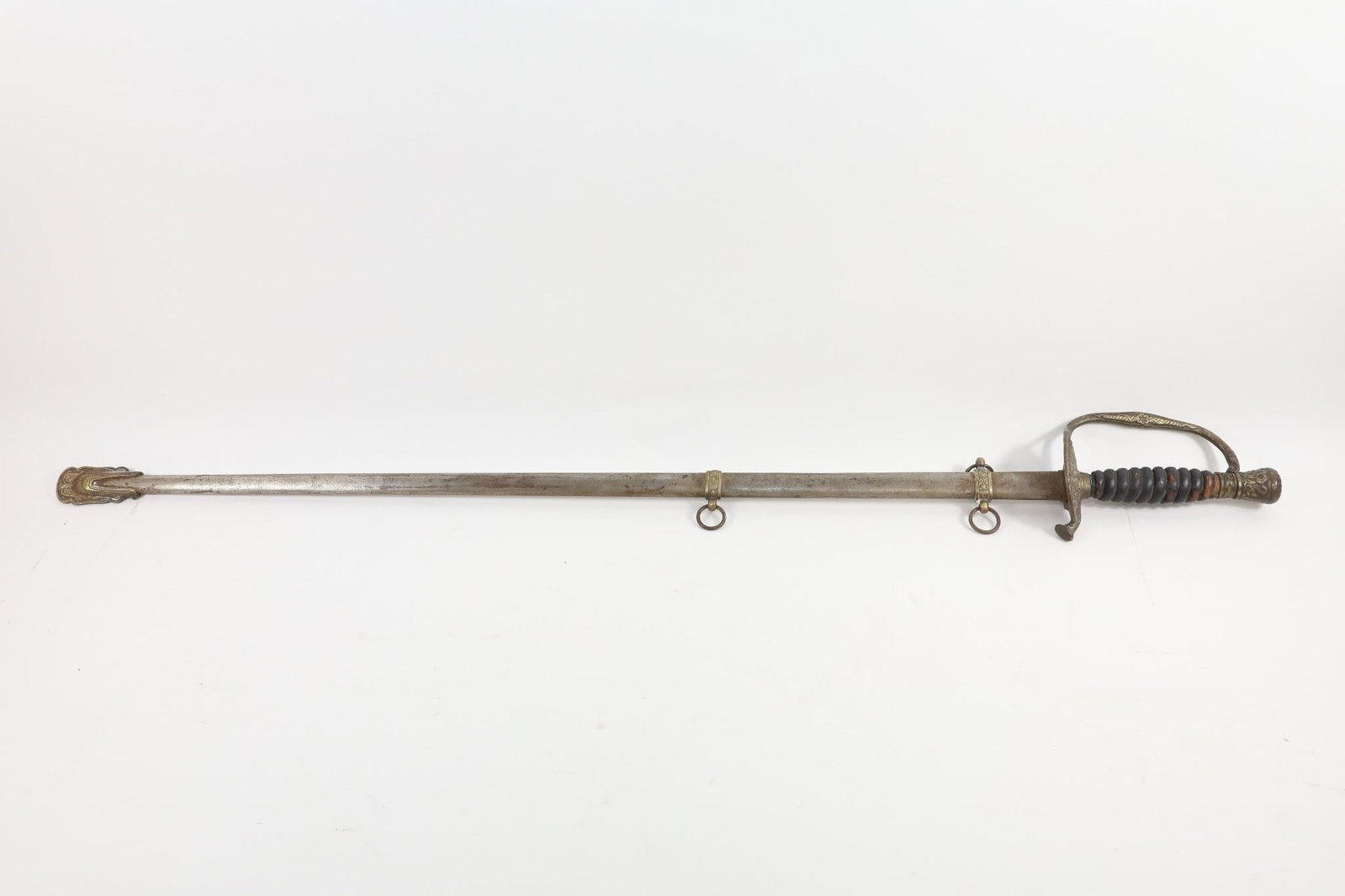 U.S. Model 1860 Officers Sword & Scabbard: Civil War Era U.S. Model 1860 Staff and Field Officer's presentation grade sword.Overall length: approximately 34 inches; blade length: approximately 28.5 inches.