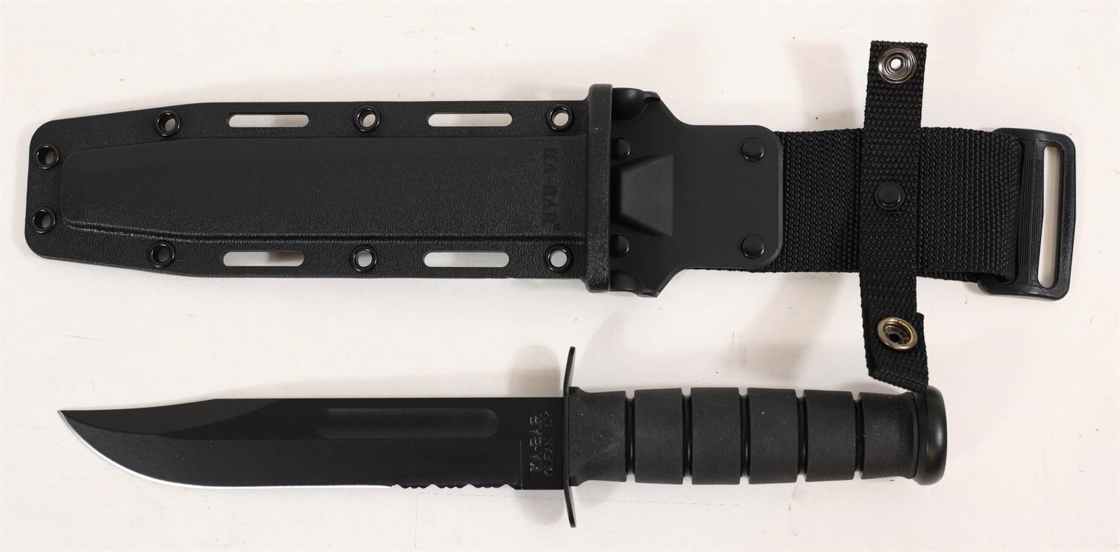 Ka-bar 1214 Black Full-size 11.75" Knife: This Ka-bar 1214 Black Full-size 11.75" Knife Combines A Robust 1095 Cro-van High-carbon Steel Blade With A Partially Serrated Edge For Efficient Slicing Of Synthetic Materials And Handling Tougher