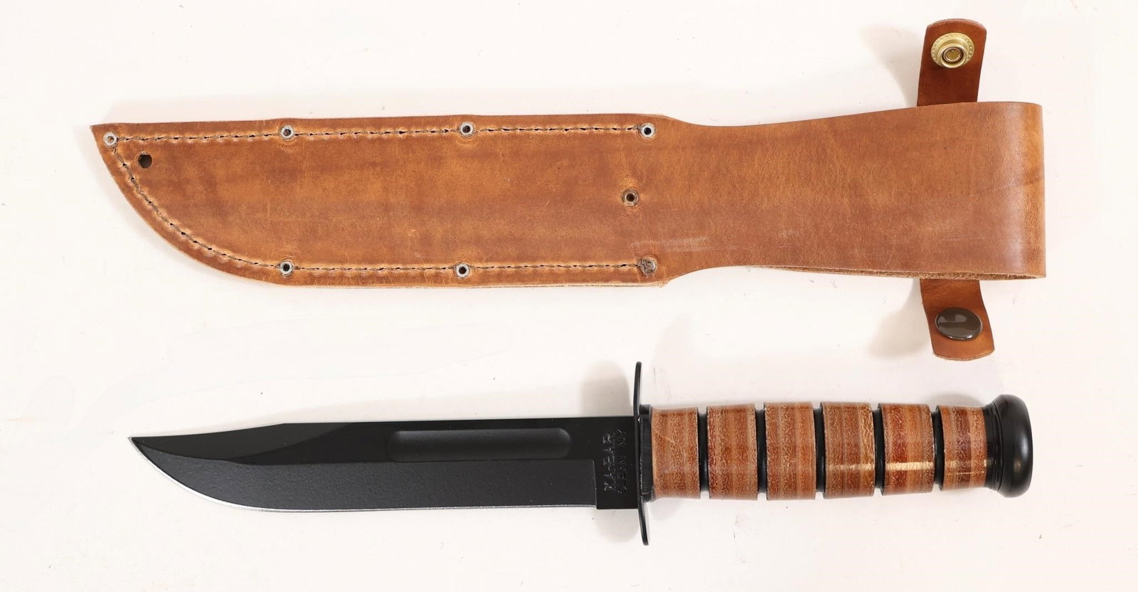 Ka-bar 1217 Usmc Full-size Clip Point 11.87" Knife: This Ka-bar 1217 Usmc Full-size Clip Point 11.87" Knife Features A 7-inch Clip Point Blade In 1095 Carbon Steel Heat Treated To Hrc 56-58 And Honed To A 20 Degree Edge Angle For Dependable Cutting