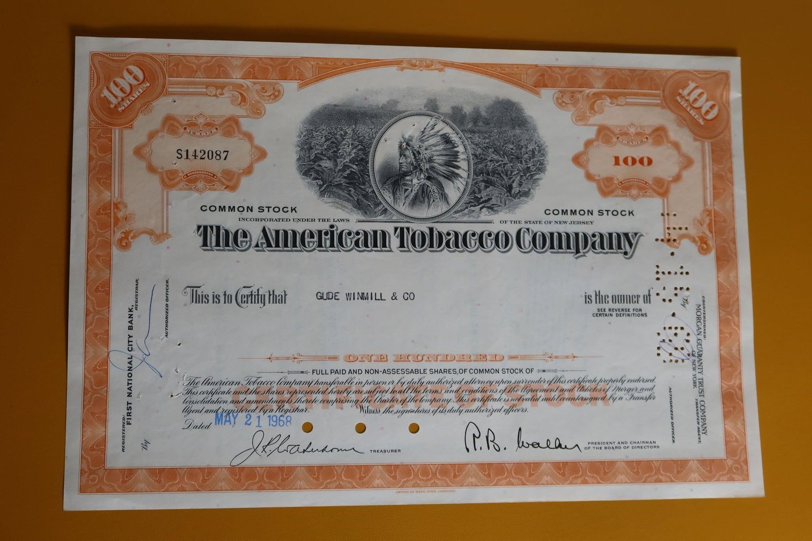 The American Tobacco Company stock certificate: A vintage The American Tobacco Company stock certificate, dated May 21, 1968, for 100 shares of common stock. These certificates are highly prized by collectors and sold as historical collectibles,