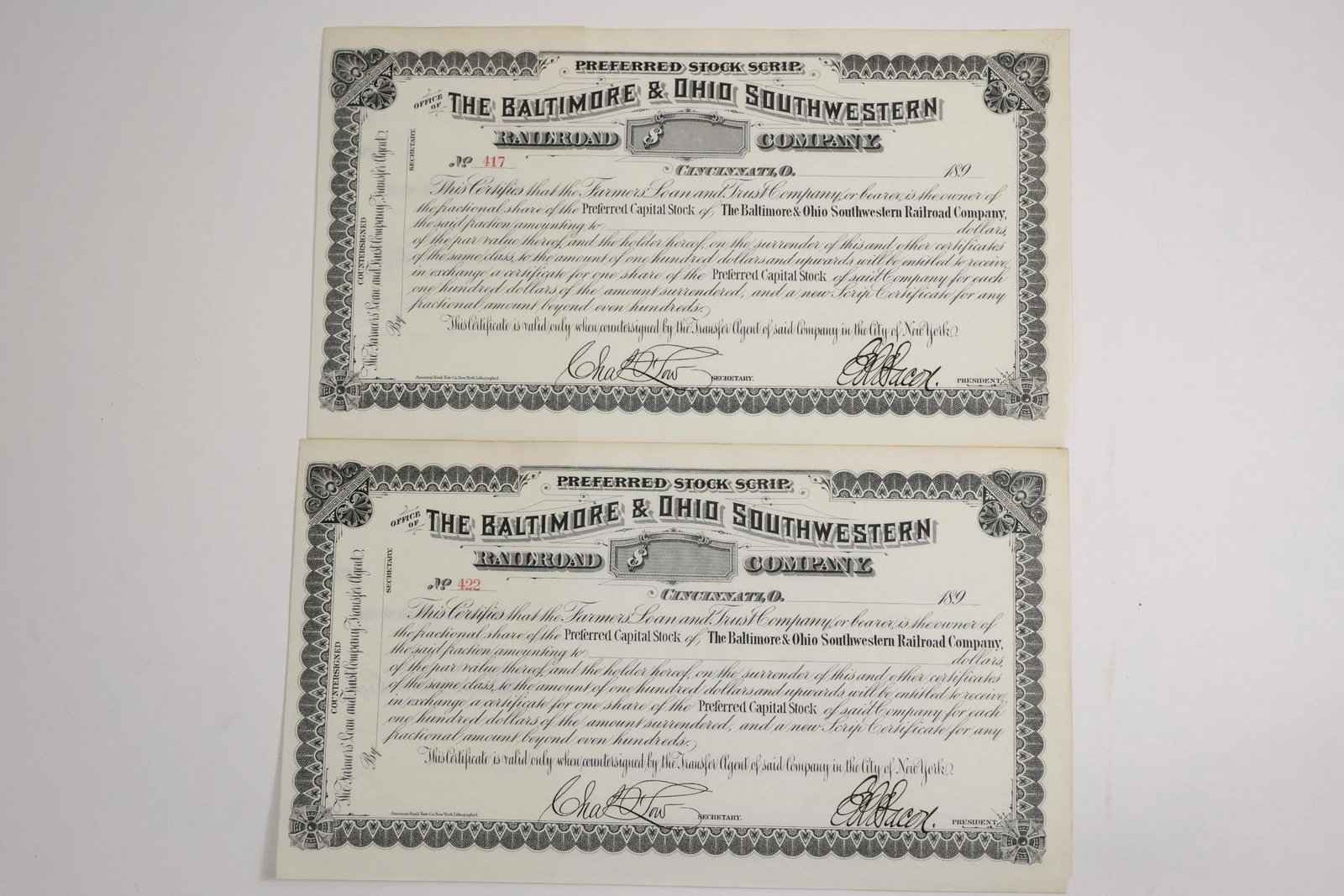 B&O Southwestern Railroad 1890s Preferred Scrips: Two preferred stock scrip certificates from the Baltimore & Ohio Southwestern Railroad Company, 1890s. Popular collectibles for scripophily and historical finance enthusiasts.
