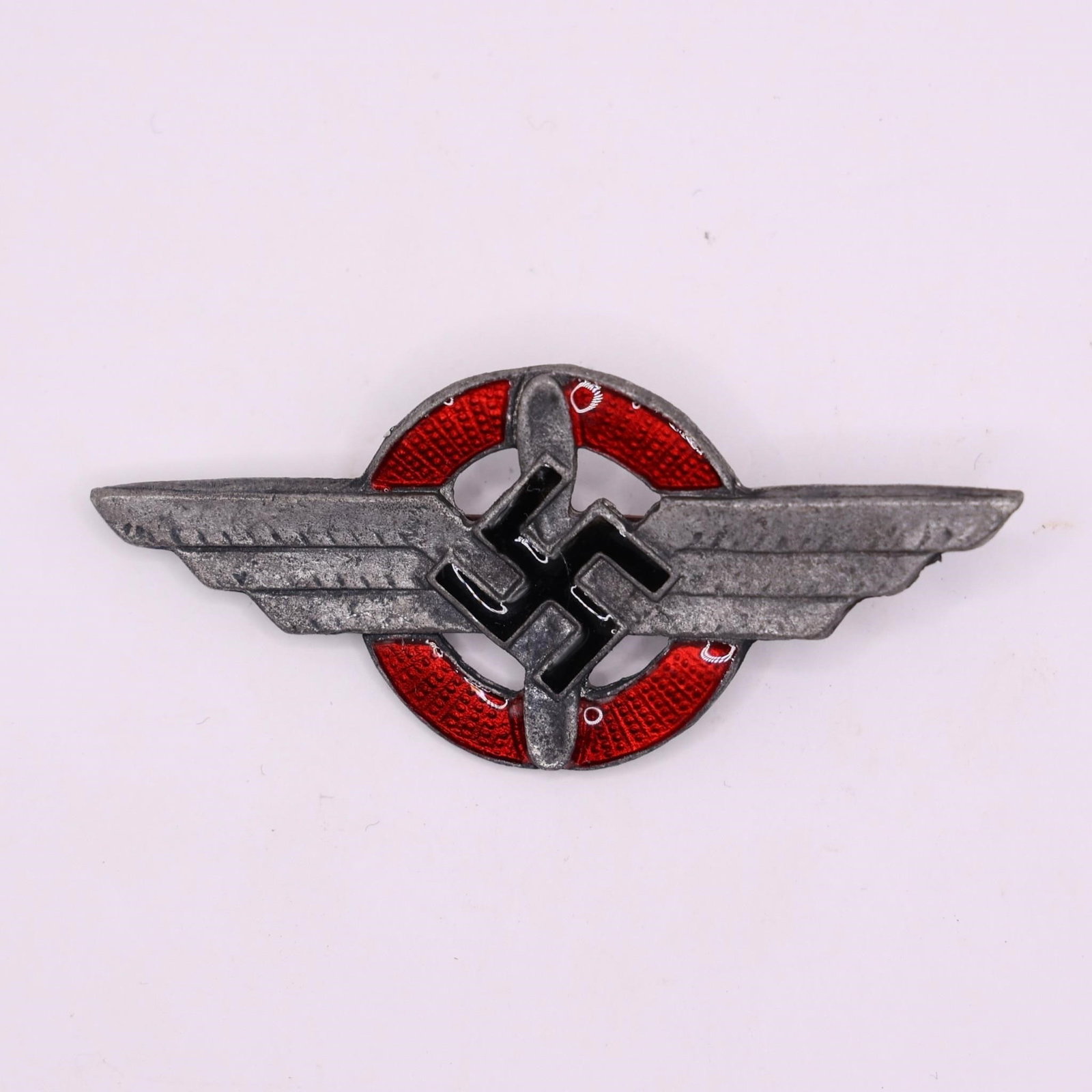 DLV Visor Cap Enamel Insignia: The DLV enamel cap insignia was worn by members of the Deutscher Luftsportverband, a Nazi-era organization (1933) that trained civilian glider pilots in preparation for the future Luftwaffe under