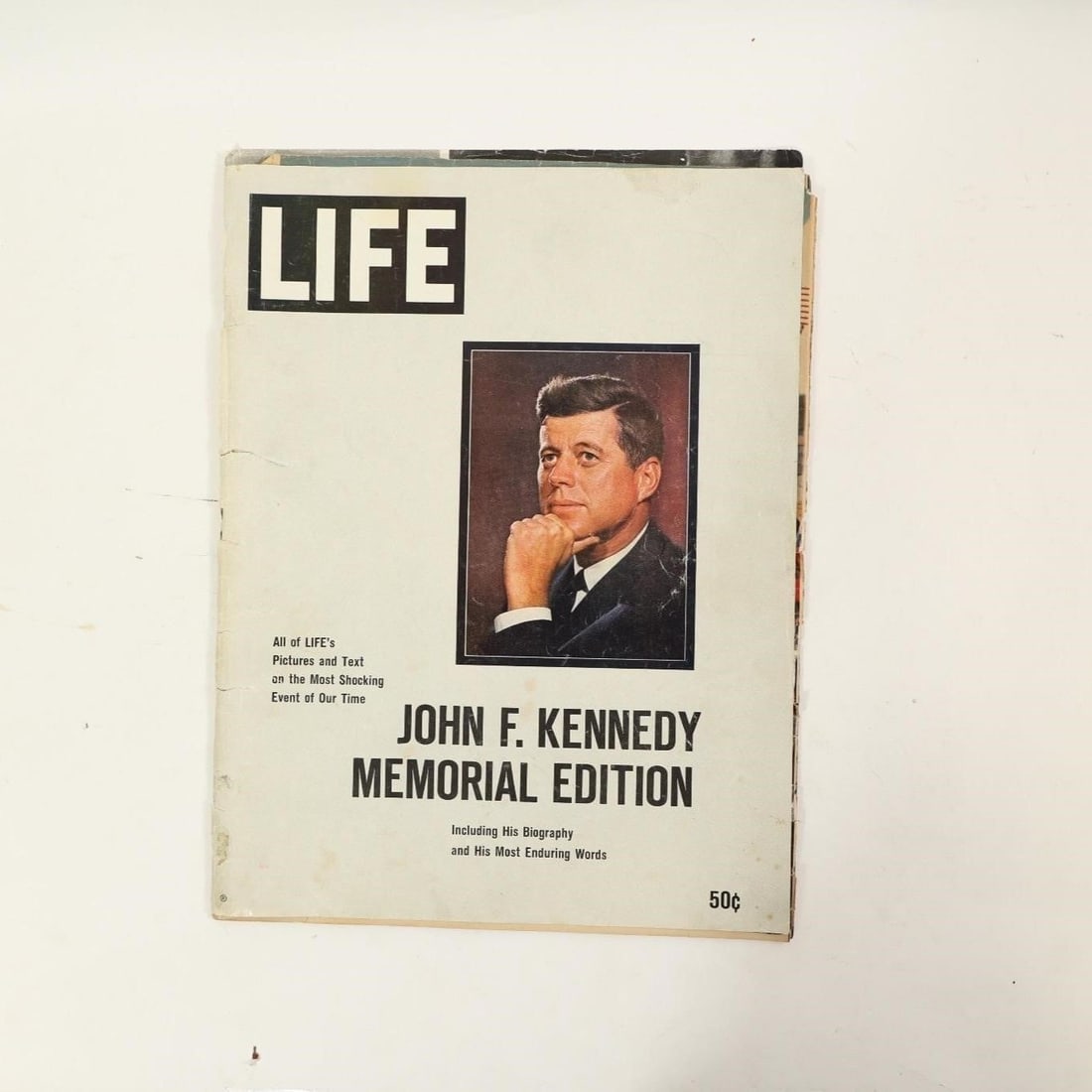 LIFE Magazine John F. Kennedy Memorial Edition: LIFE magazine special issue titled "John F. Kennedy Memorial Edition," published following the assassination of President John F. Kennedy in 1963. The cover features a portrait of Kennedy and