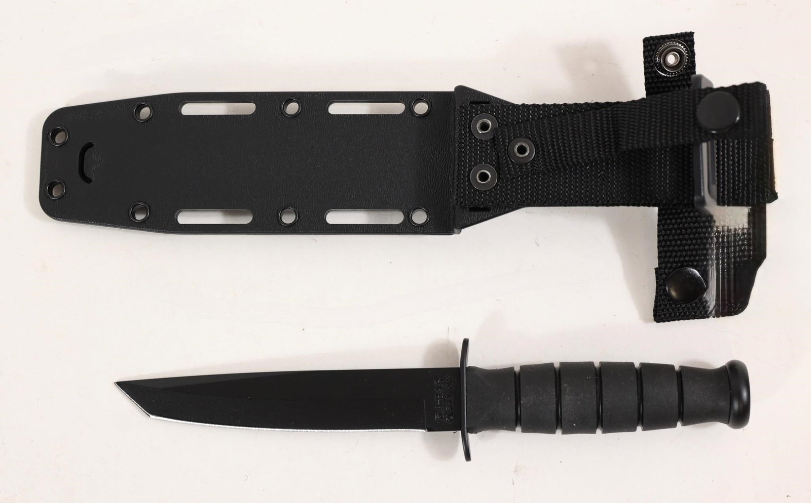 Ka-bar Tanto Black Short 9.37" Fixed Blade Knife: This Ka-bar Tanto Black Short 9.37" Fixed Blade Knife Features A 5.25-inch 1095 Cro-van Steel Blade With A 0.165-inch Blade Thickness And A Hollow Grind That Delivers Reliable Cutting Performance. The