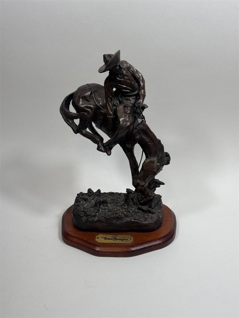 Bronze After Remington "Outlaw": Bronze after Frederic Remington's "Outlaw," 20th century, mounted on a black marble base. Total height: 22 inches