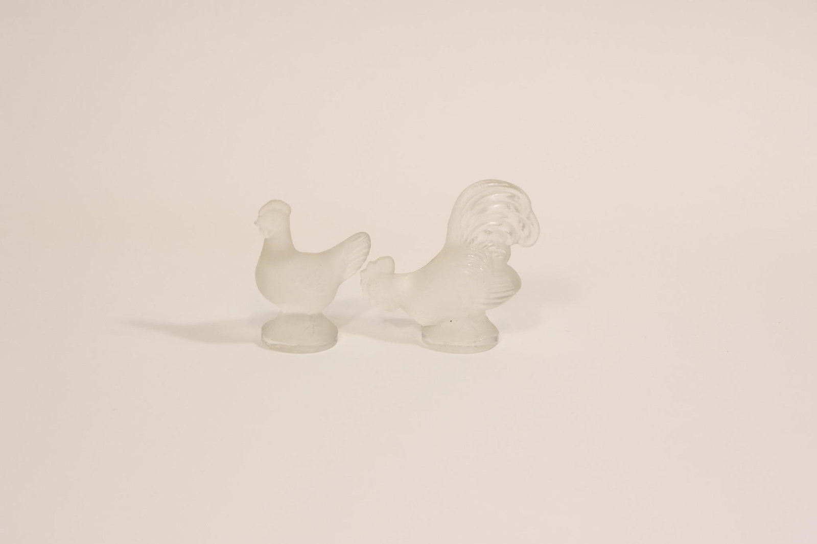 Vintage Frosted Lalique Chicken & Rooster Set: Set of vintage frosted glass chicken and rooster figurines, possibly by makers such as L.E. Smith or Sabino; featuring soft matte finish and detailed forms, ideal for collectors or decorative display