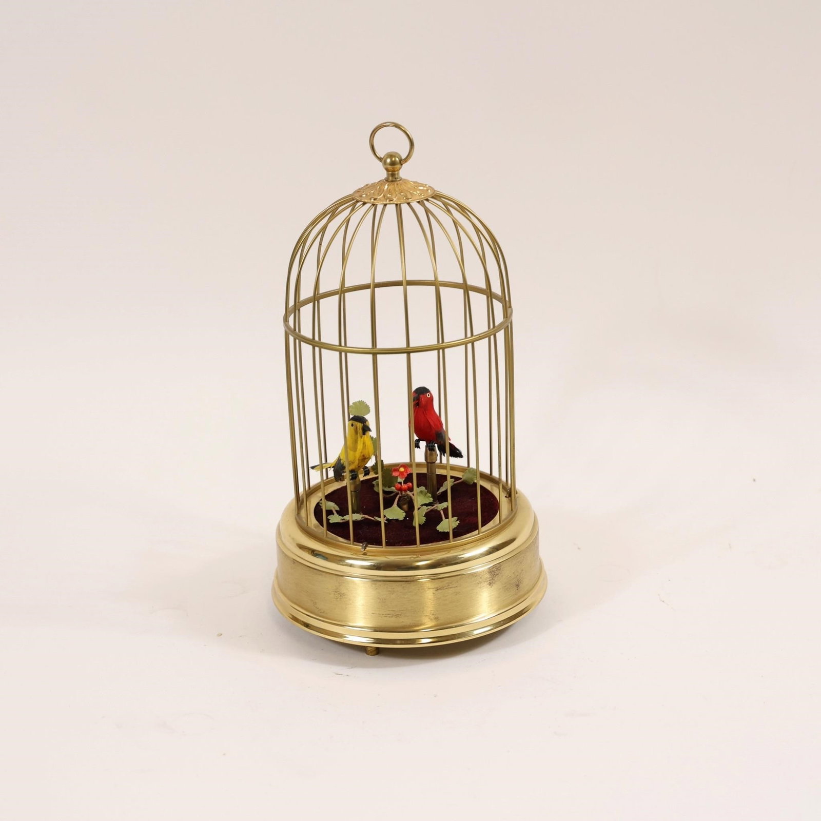 German Singing Bird Automaton: This item is a German singing bird automaton, likely produced in the mid-20th century.