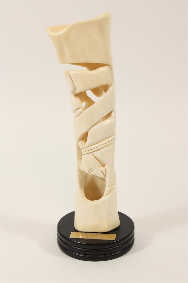 Women of Valor Bone Sculpture, 1981: Decorative carved bone sculpture titled Women of Valor, mounted on a black display base with an engraved plaque reading "Women of Valor - Gertrude Rosen - April 1981." The intricate openwork design