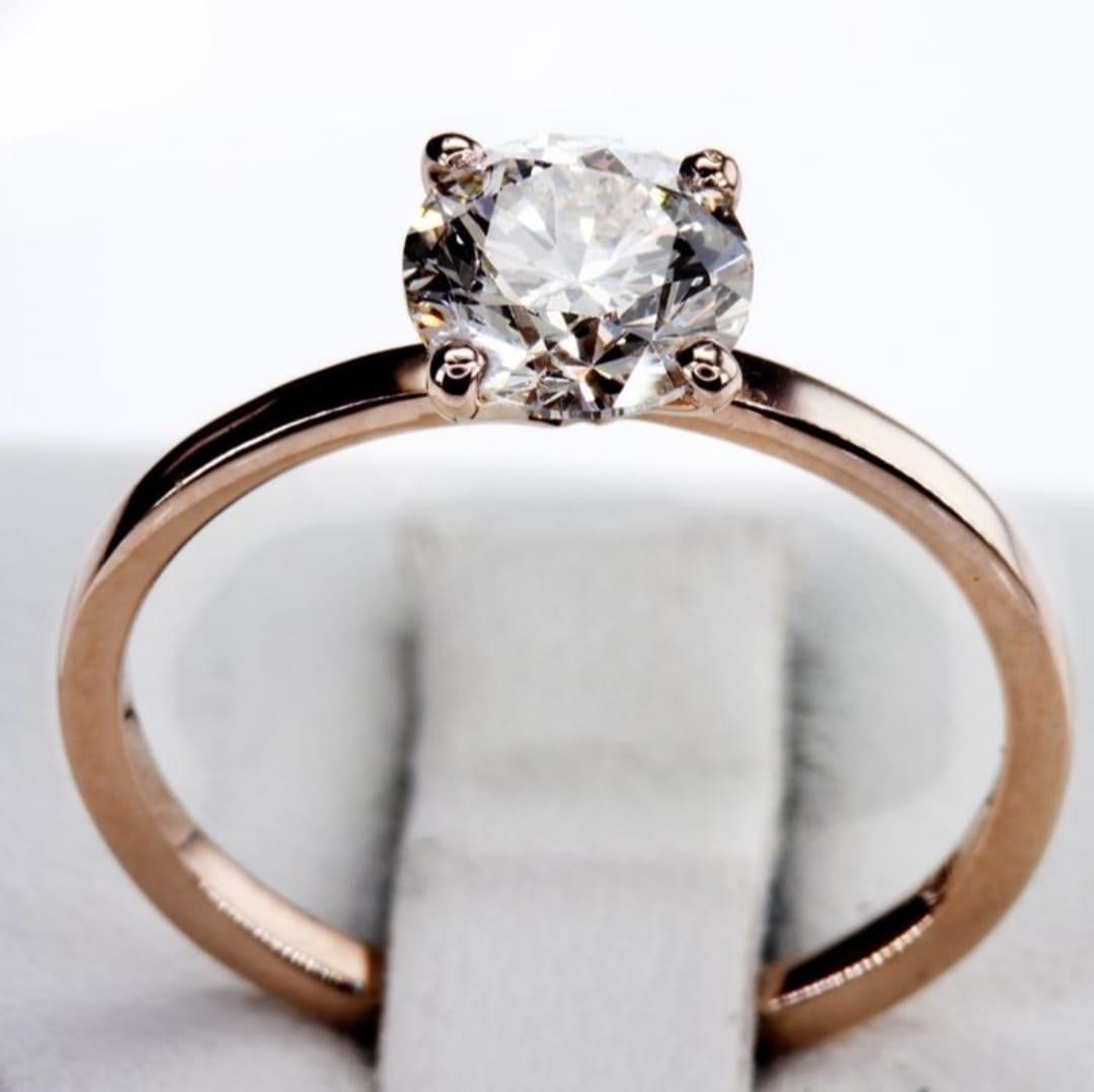 Natural Diamond Ring 1.21 Ct: One rose gold ring set with one round brilliant cut Weight: 1.77 gramsPre-Stamped: "14K"Ring size53 (EU) / 13 (IT) / 6 ¼ (US)Natural DiamondColor: IClarity: SI2Estimated weight: 1.21