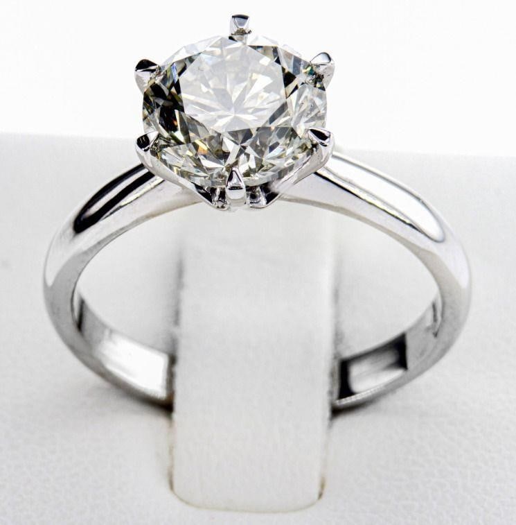 Natural Round Cut Diamond Ring 2.58ct: Center Stone Type: Natural DiamondShape and Cutting Style: Round BrilliantCarat Weight: 2.58 ctColour Grade: JClarity Grade: SI1Metal: White Gold, 14K / 585Jewelry Weight 3.48 gr.Diamond colour grade