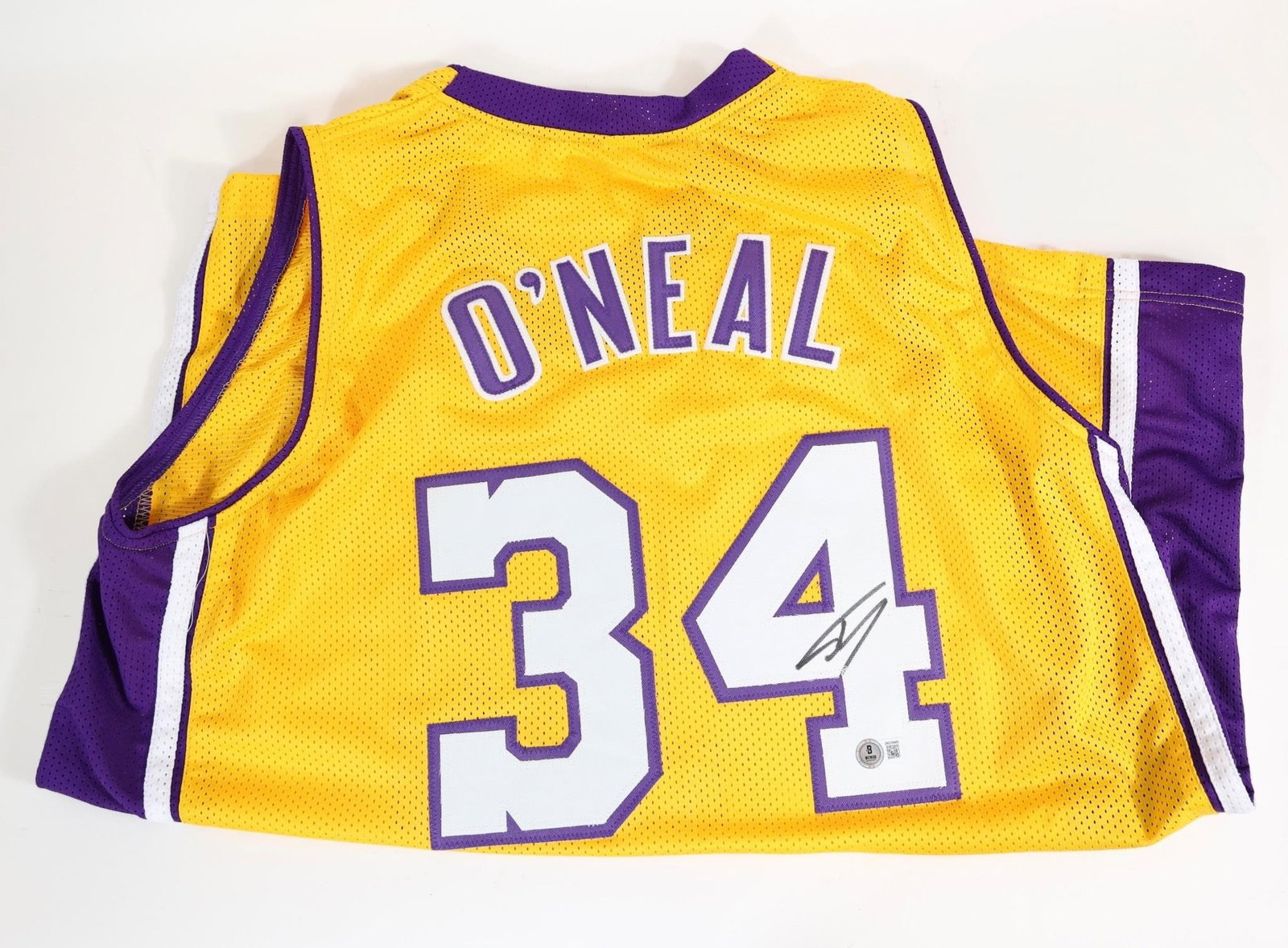 Shaquille O'Neal Lakers #34 Signed Jersey: This item has been SIGNED with permanent sharpie marker.This item was signed at a private signing session and comes with Hologram Certificate of Authenticity, and they are World Leaders in this