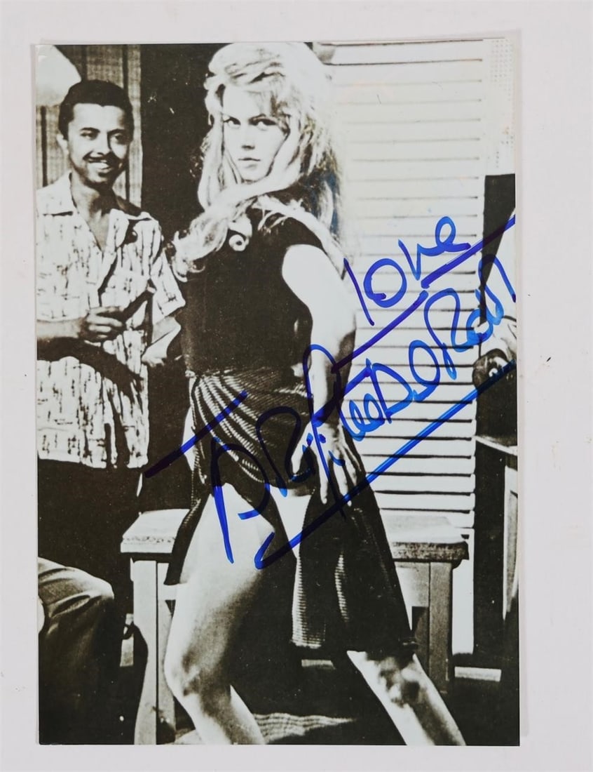 Brigitte Bardot Signed Photo: BRIGITTE BARDOT(Deceased French actress and film legend)A very beautiful scene photograph-specifically created to be signed by Brigitte Bardot-from the film:...And God Created Woman- Hand-signed by Br
