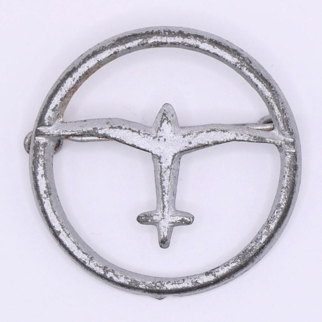 German Air Sports Association (DLV) Supporter Pin: A small metal tinnie showing a stylized aircraft inside a circular border. These pins were worn by supporters of the Deutscher Luftsportverband (DLV), the organization responsible for early pilot trai