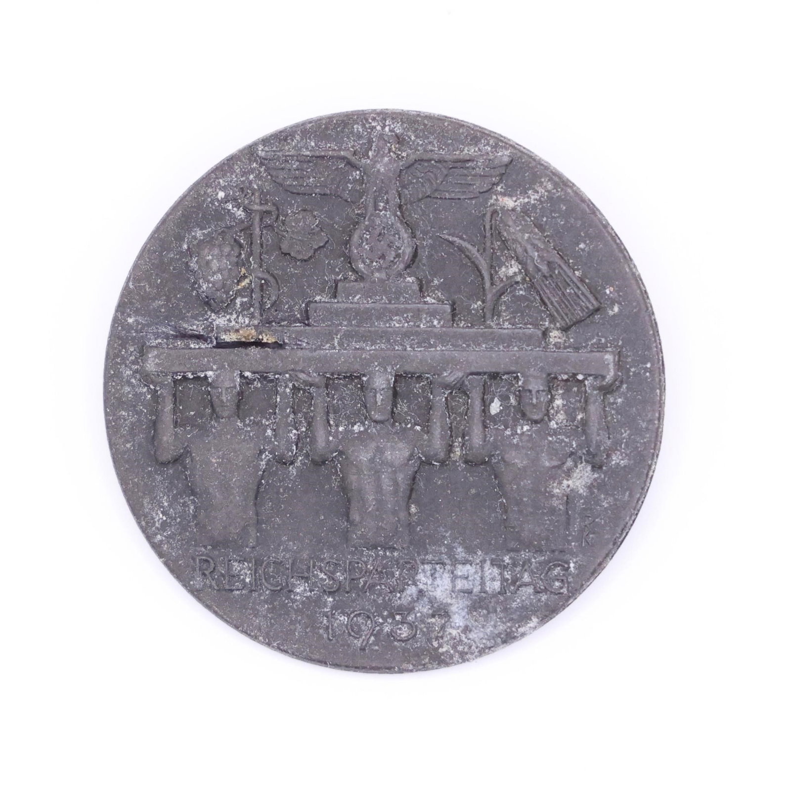 German WWII Reichsparteitag 1937 Tinnie: Original German WWII Reichsparteitag (Nazi Party Rally) 1937 tinnie, metal pinback, good condition, authentic period piece.